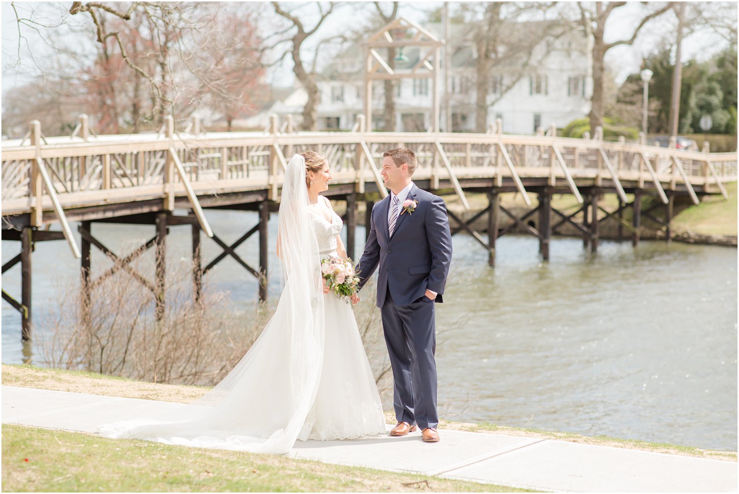 Bride and groom posing for photos in Spring Lake NJ 
