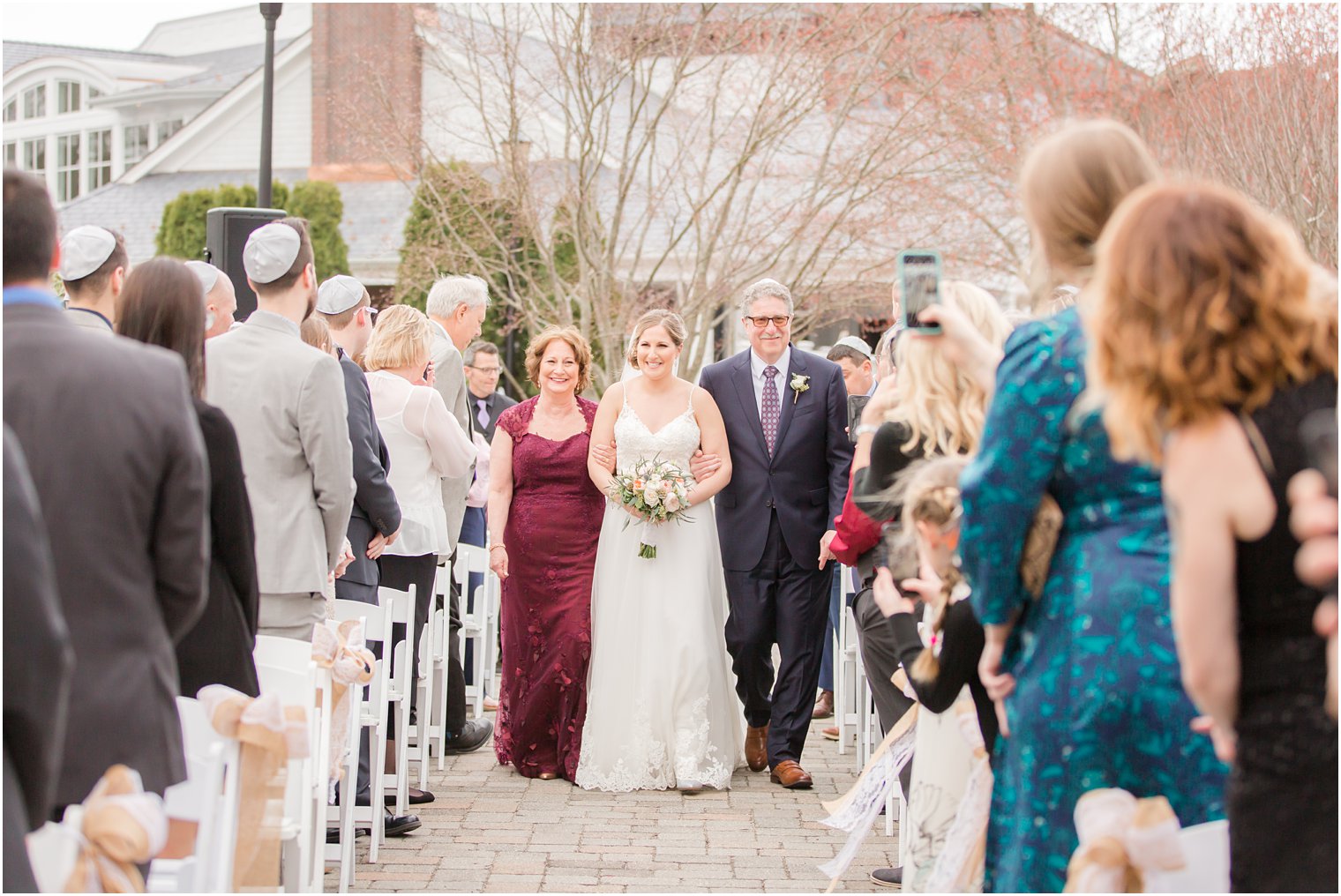 Bride walking down the aisle | Outdoor wedding ceremony at The Mill Lakeside Manor Wedding