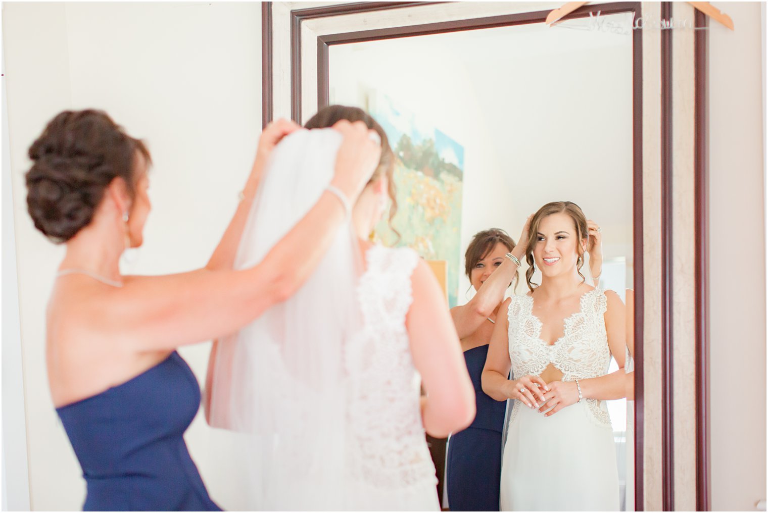 bride getting ready with her mom in Stone Tower Winery Wedding Photos by Idalia Photography