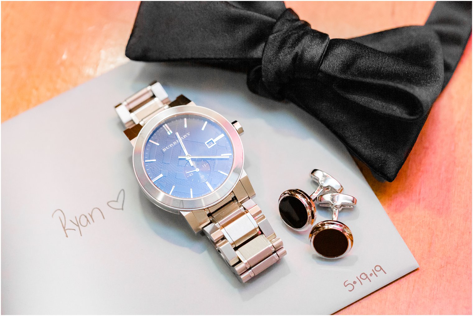 groom's watch and bow tie in Stone Tower Winery Wedding Photos by Idalia Photography