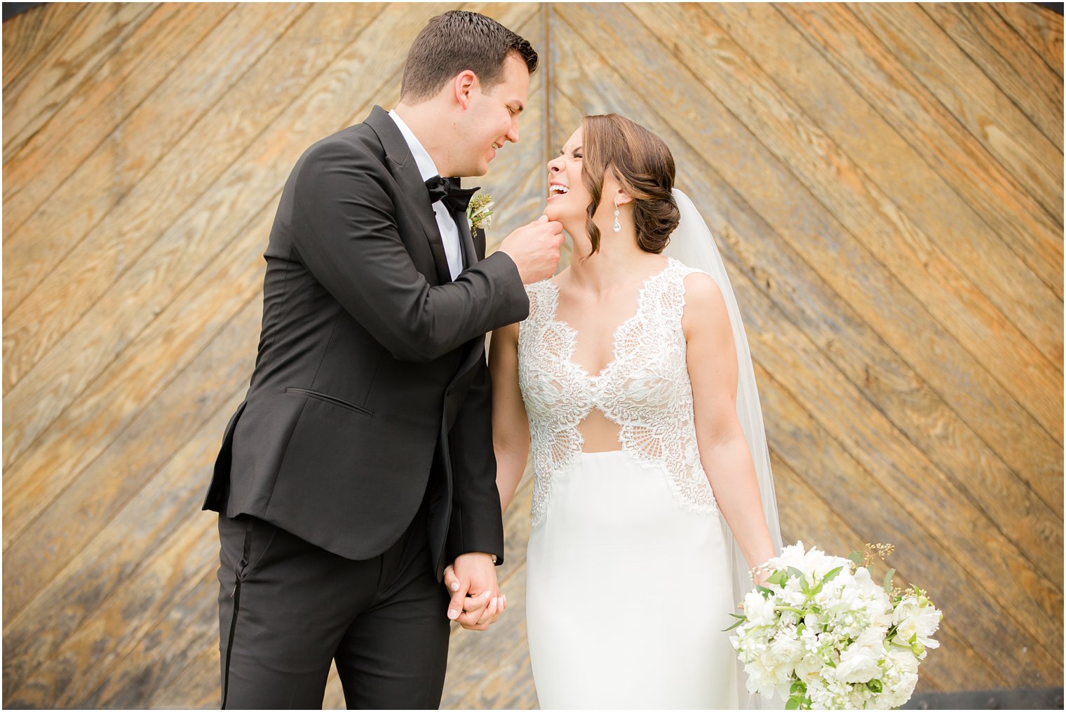 bride and groom kissing in Stone Tower Winery Wedding Photos by Idalia Photography