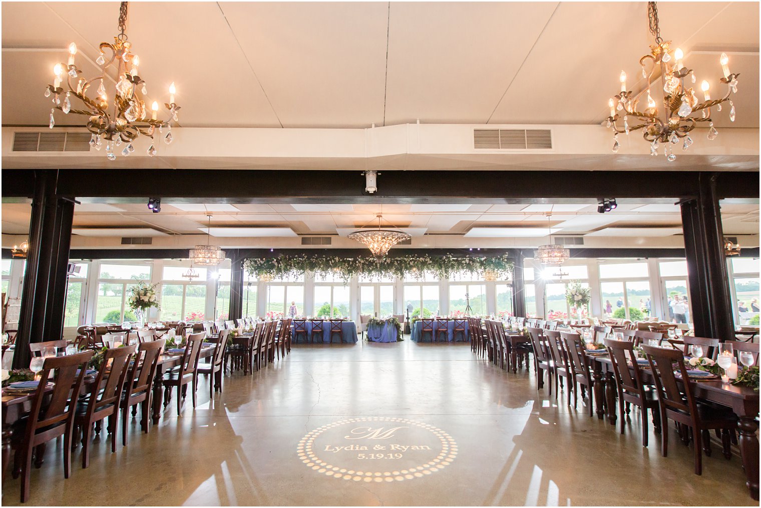 wedding reception room in Stone Tower Winery Wedding Photos by Idalia Photography