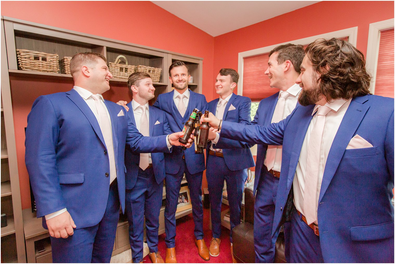 groomsmen toasting on wedding day