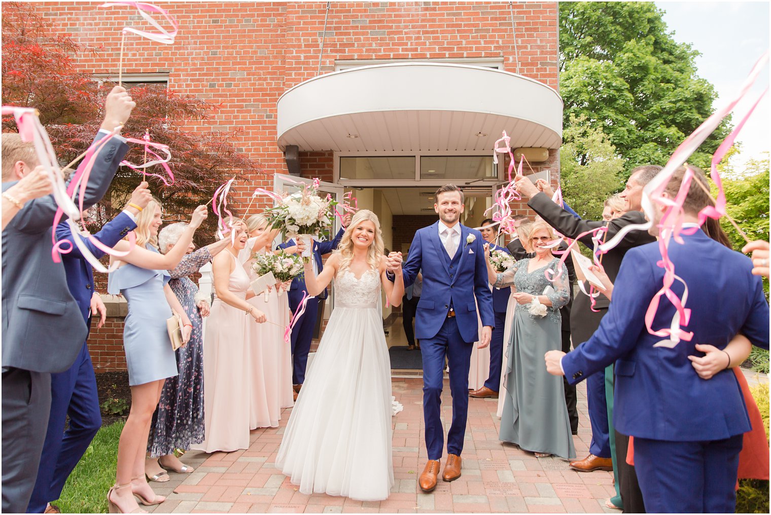 wedding church exit with ribbons at Saint Anne's Roman Catholic Church in Fair Lawn NJ