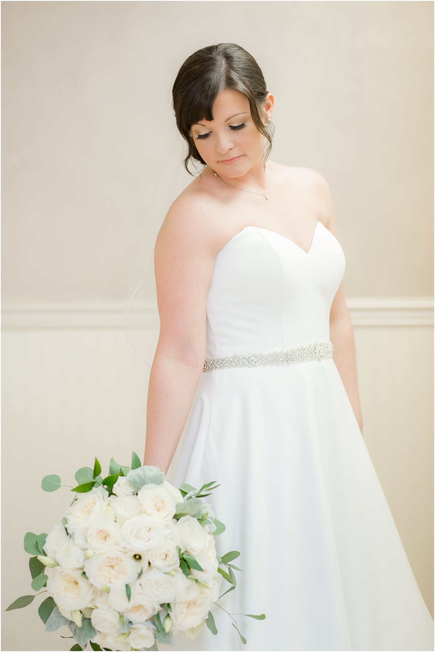 Bride in her wedding dress at Windows on the Water at Frogbridge in Millstone NJ