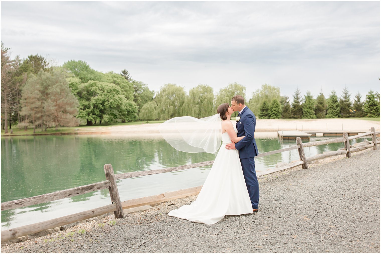 Formal bride and groom portraits at Windows on the Water at Frogbridge in Millstone NJ