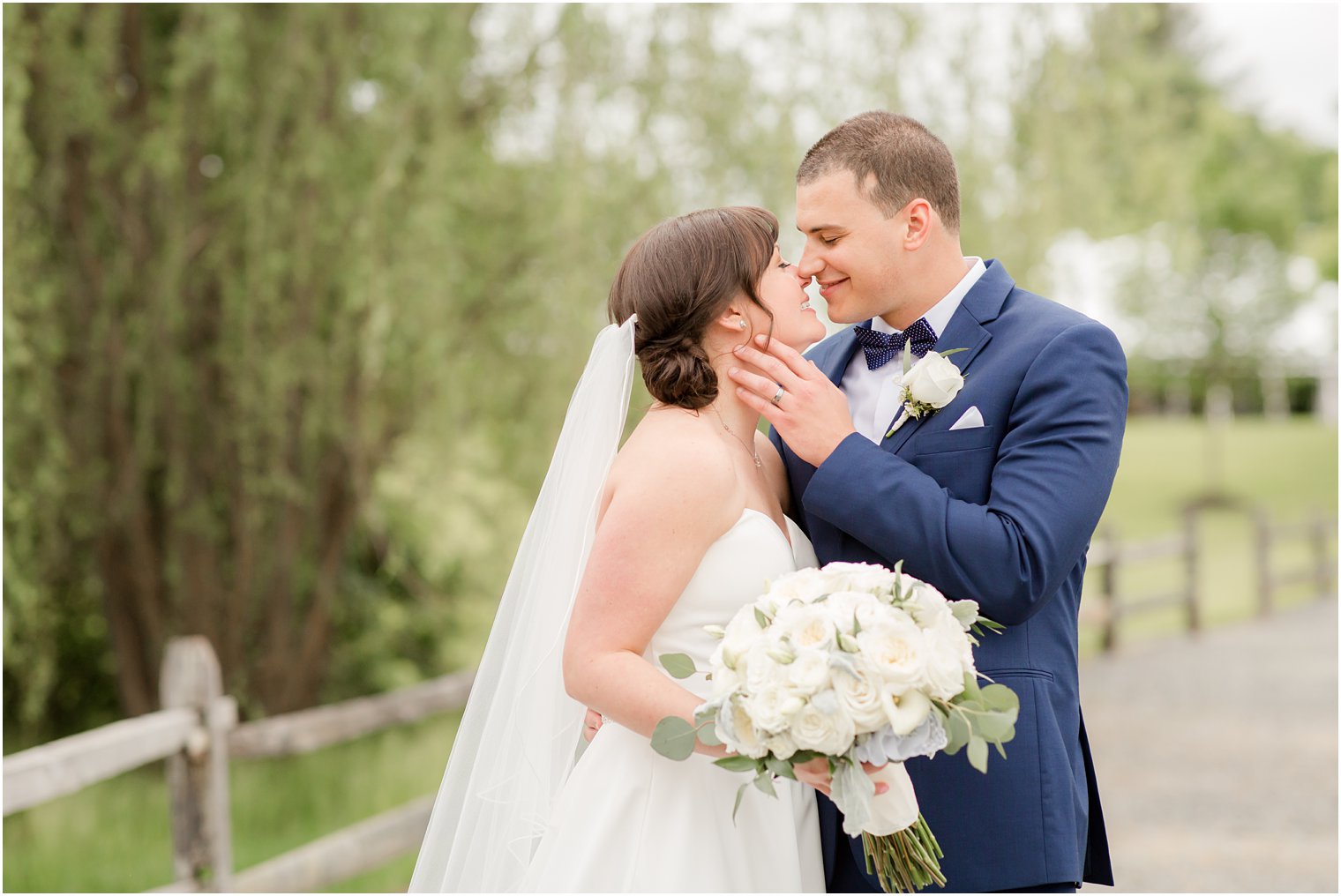 Formal bride and groom portraits at Windows on the Water at Frogbridge in Millstone NJ