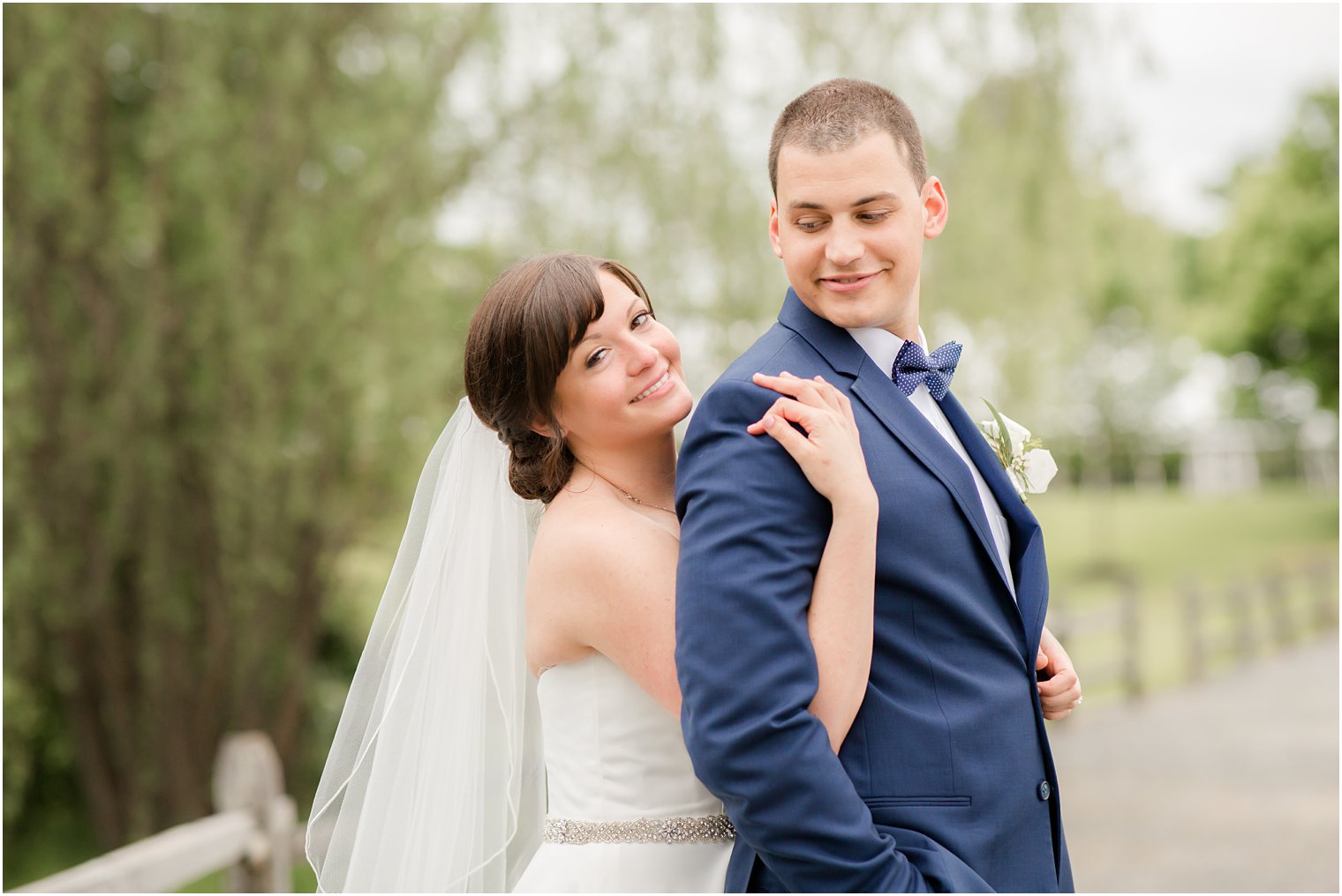 Formal bride and groom portraits at Windows on the Water at Frogbridge in Millstone NJ