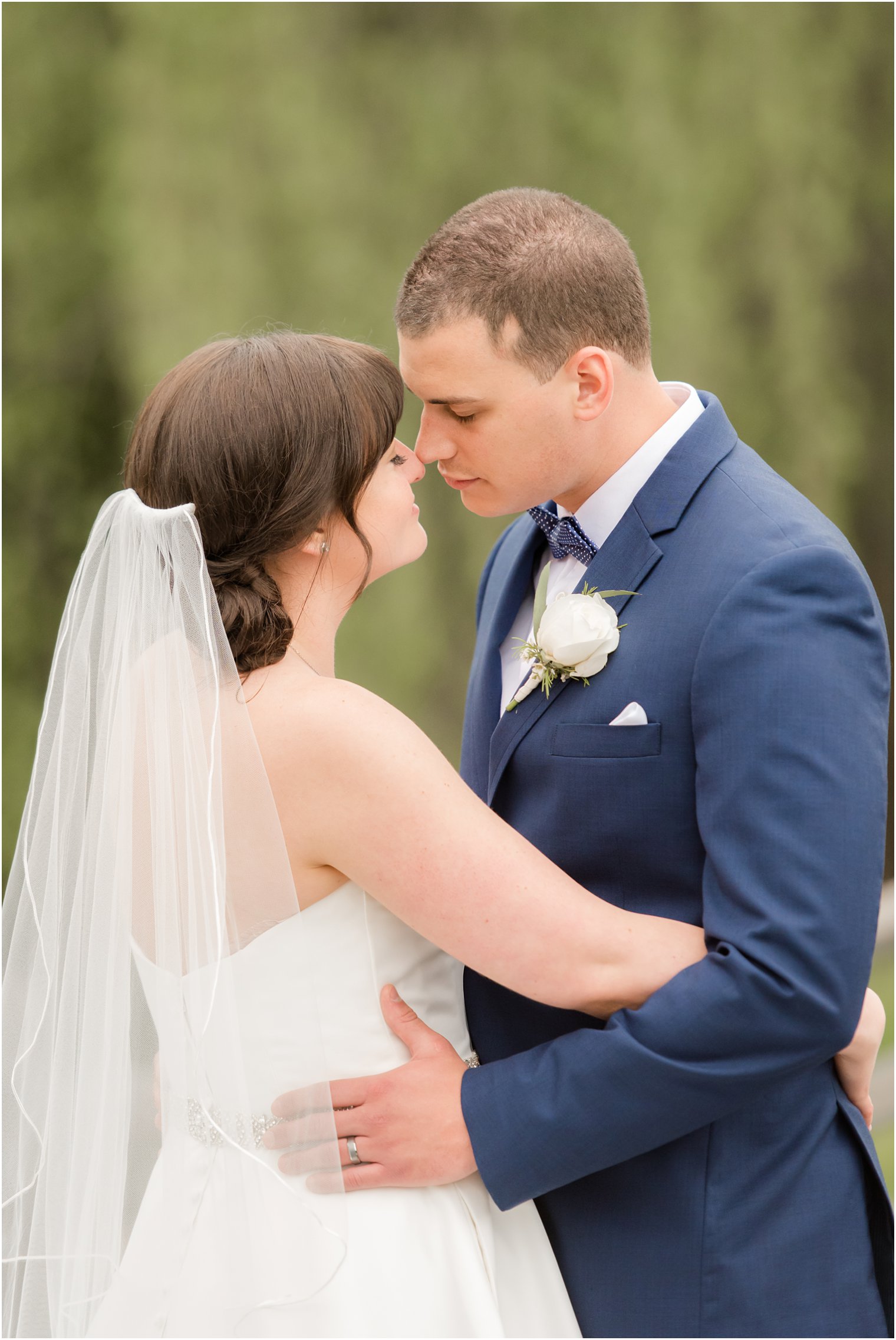 Formal bride and groom portraits at Windows on the Water at Frogbridge in Millstone NJ