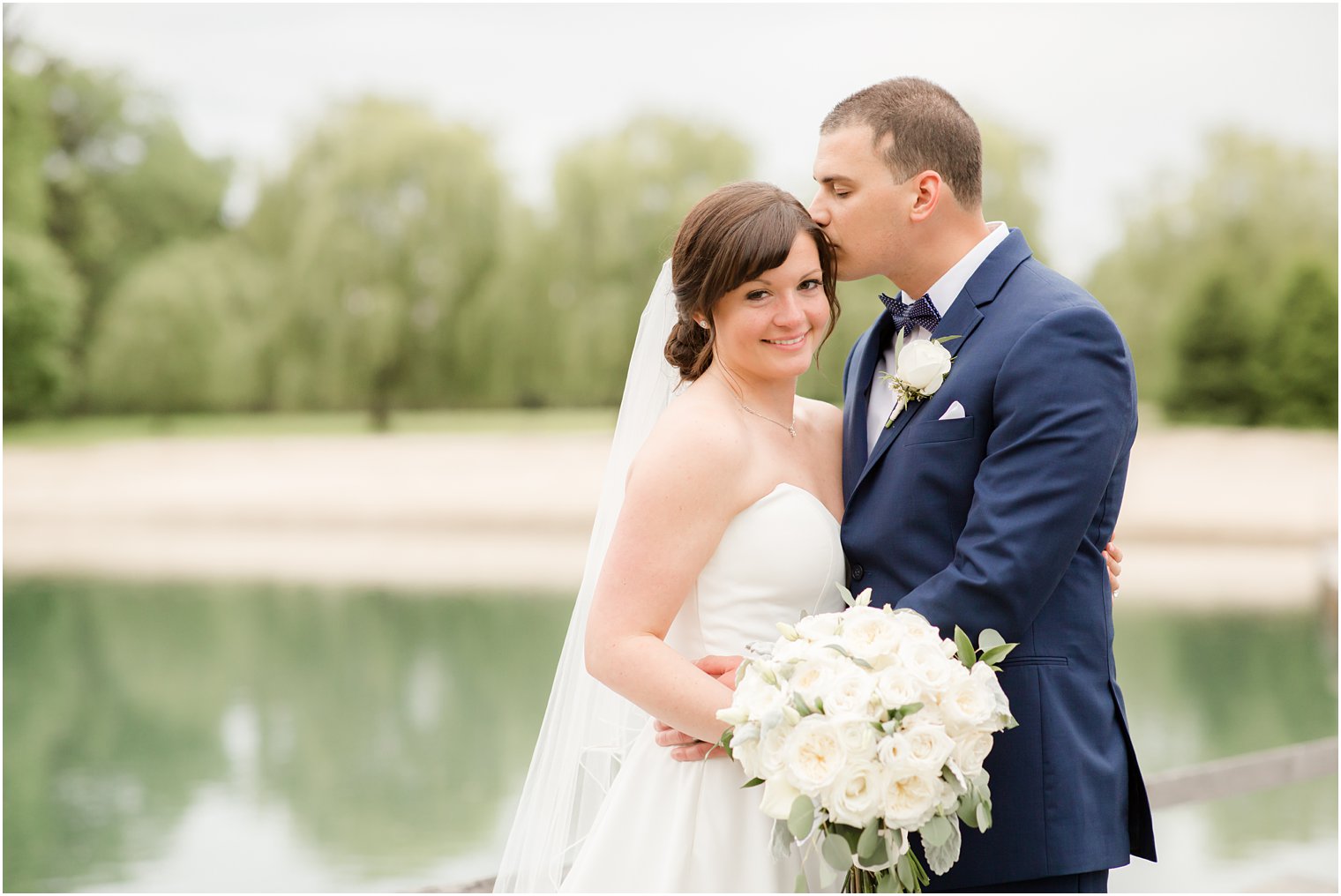 Formal bride and groom portraits at Windows on the Water at Frogbridge in Millstone NJ