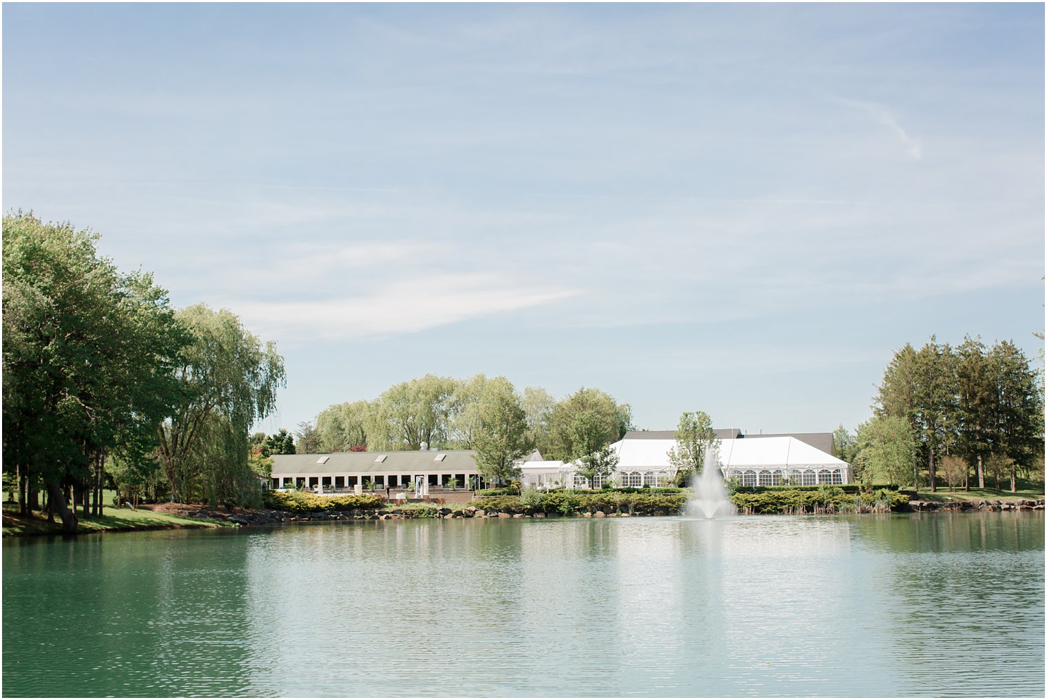 Formal bride and groom portraits at Windows on the Water at Frogbridge in Millstone NJ