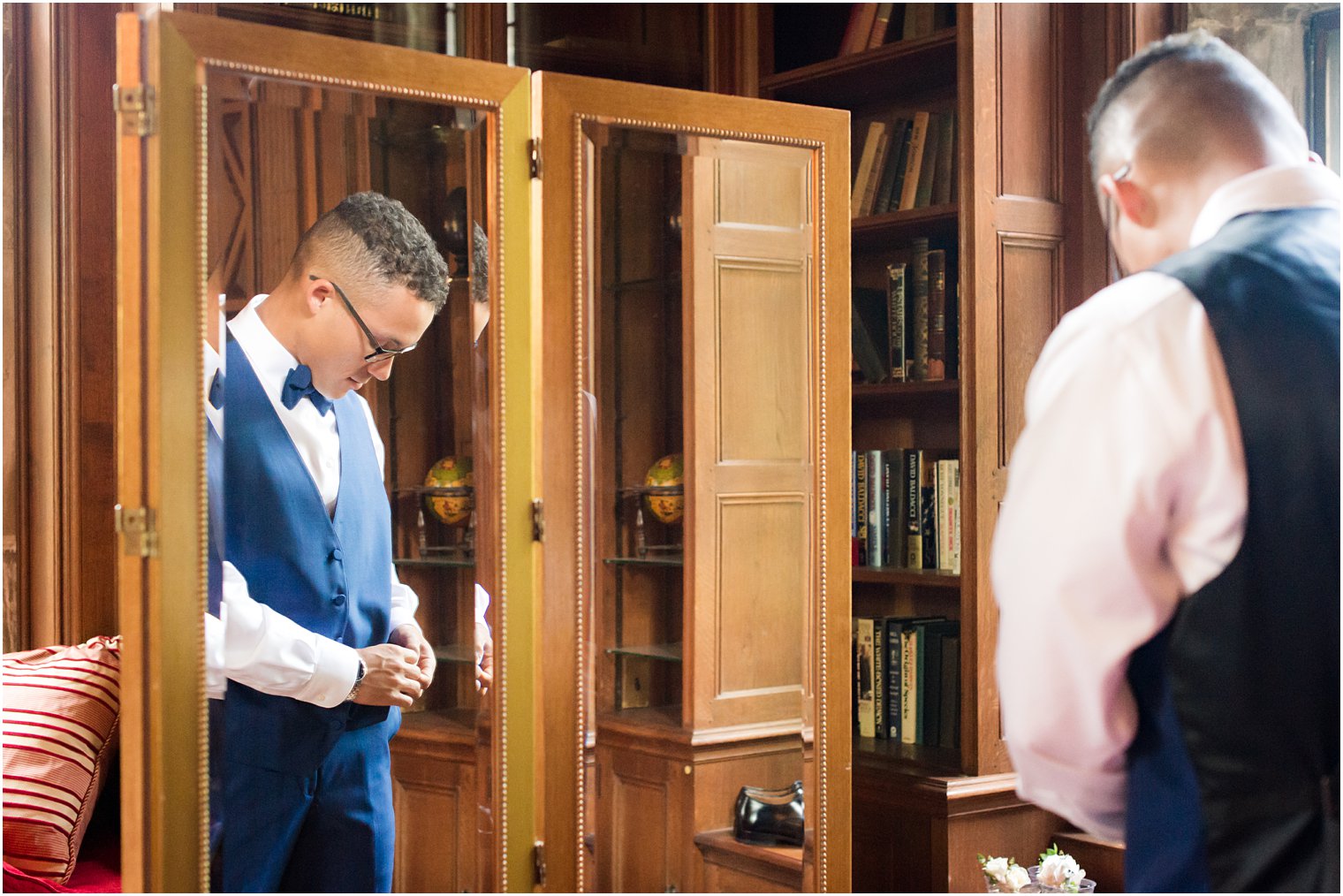 groom prep in The Castle at Skylands Manor Wedding Photos by Idalia Photography