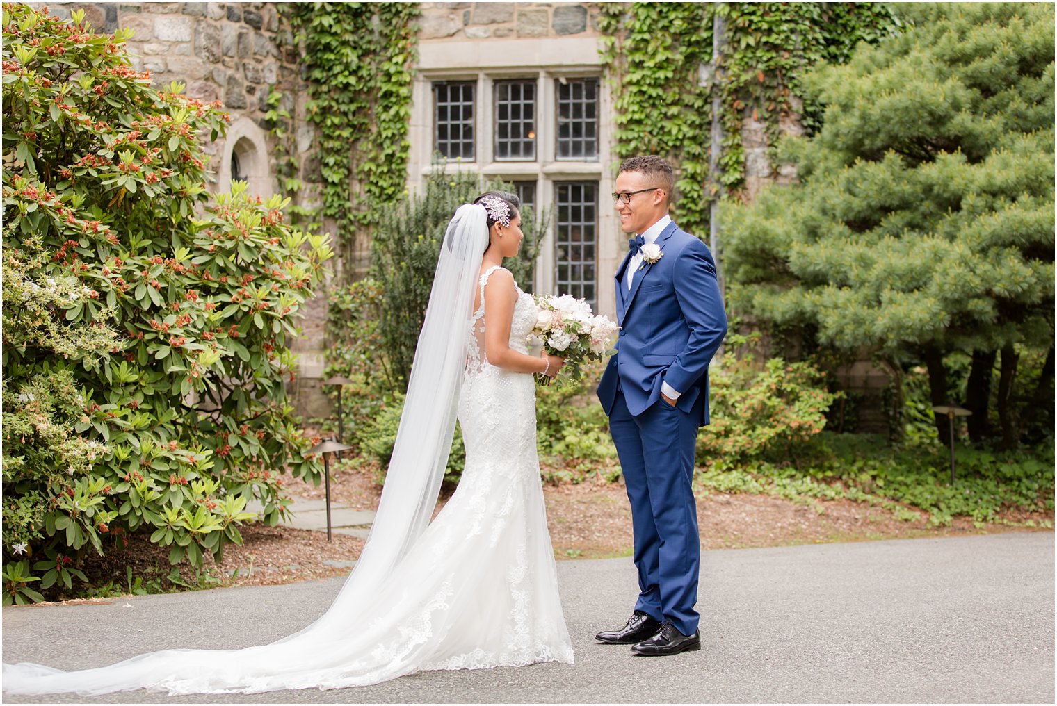 bride and groom after first look | The Castle at Skylands Manor Wedding Photos by Idalia Photography