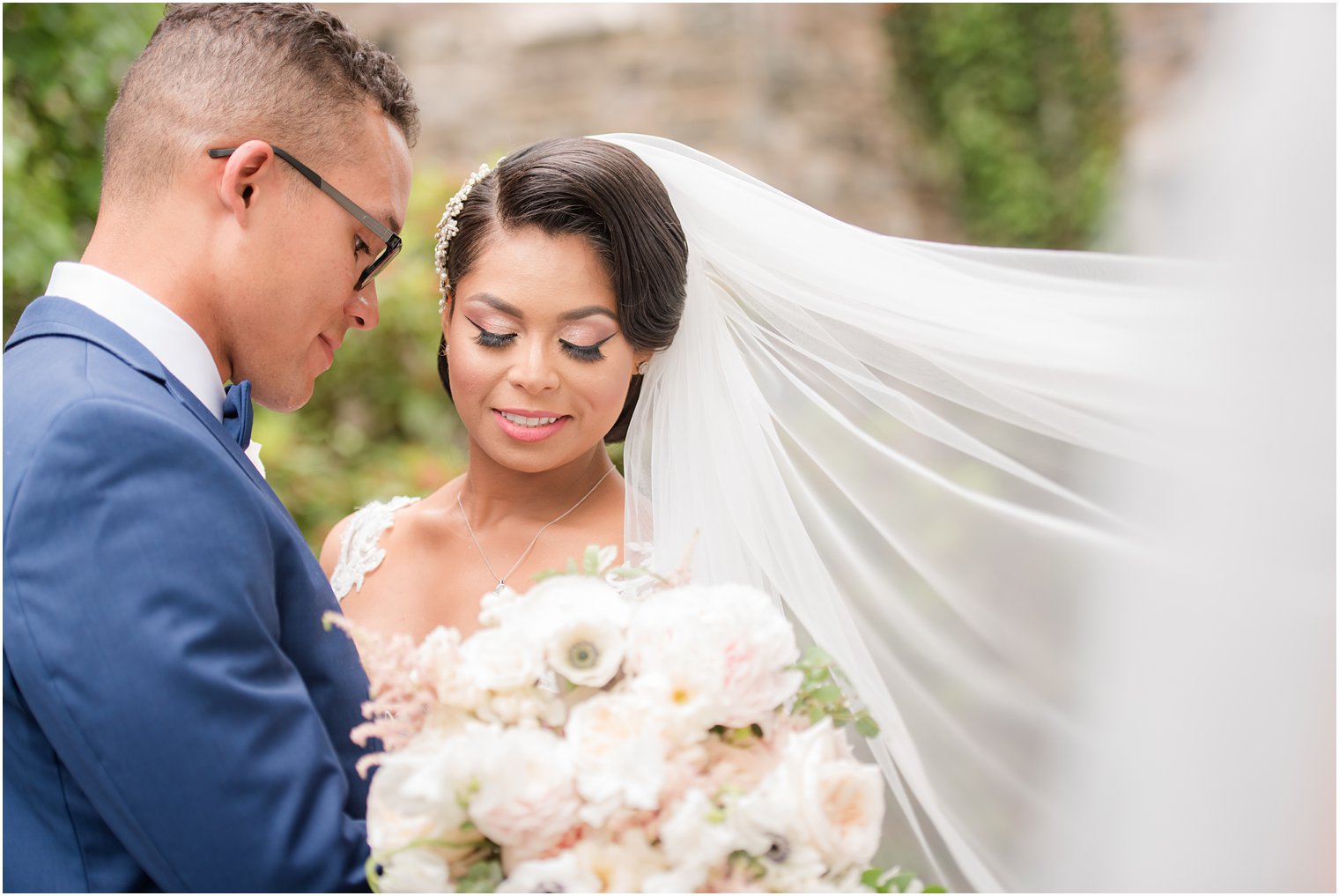 bride and groom photo with romantic veil | The Castle at Skylands Manor Wedding Photos by Idalia Photography