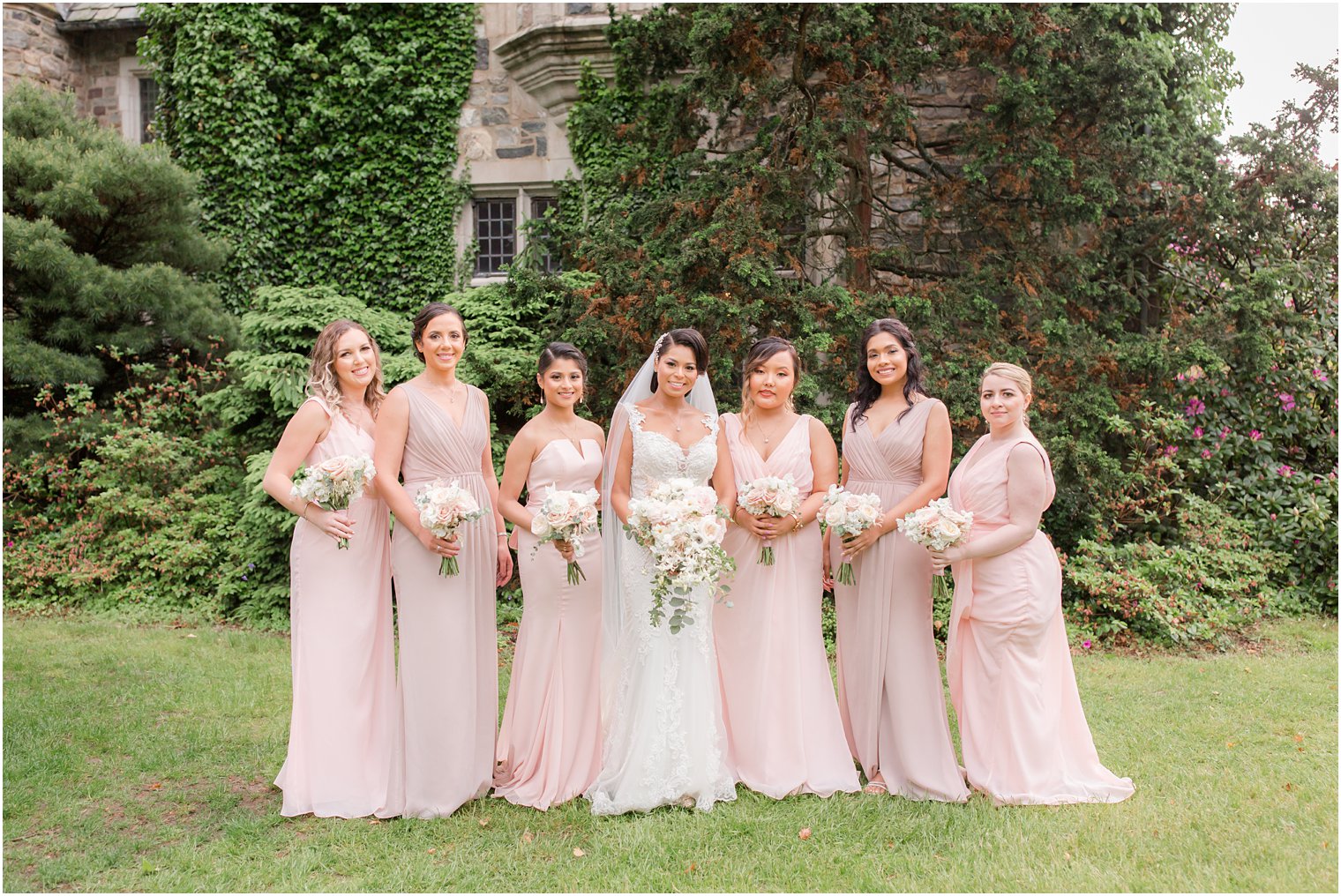 bridesmaids holding bouquets | The Castle at Skylands Manor Wedding Photos by Idalia Photography