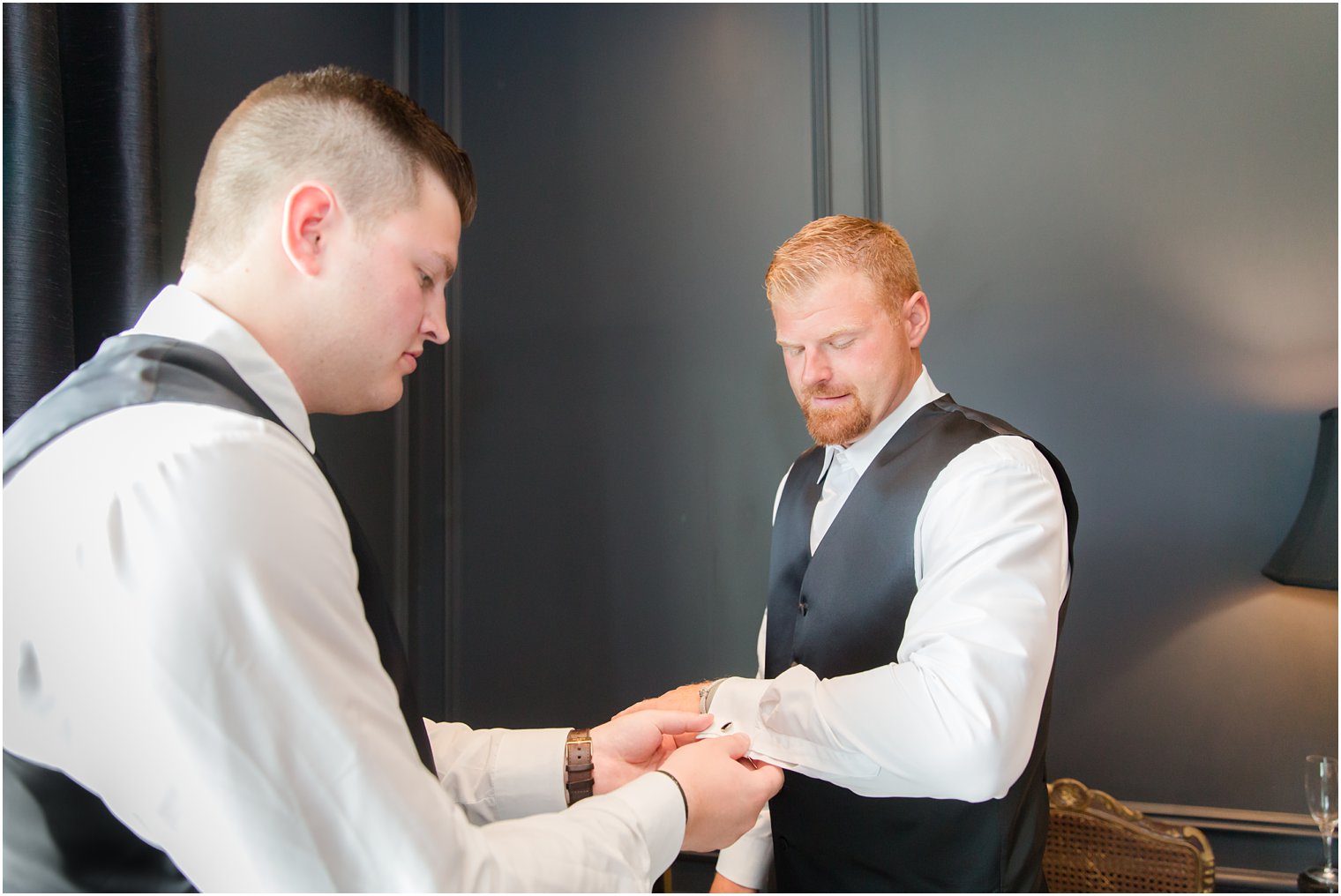 Groom getting ready for wedding at Park Chateau Estate and Gardens