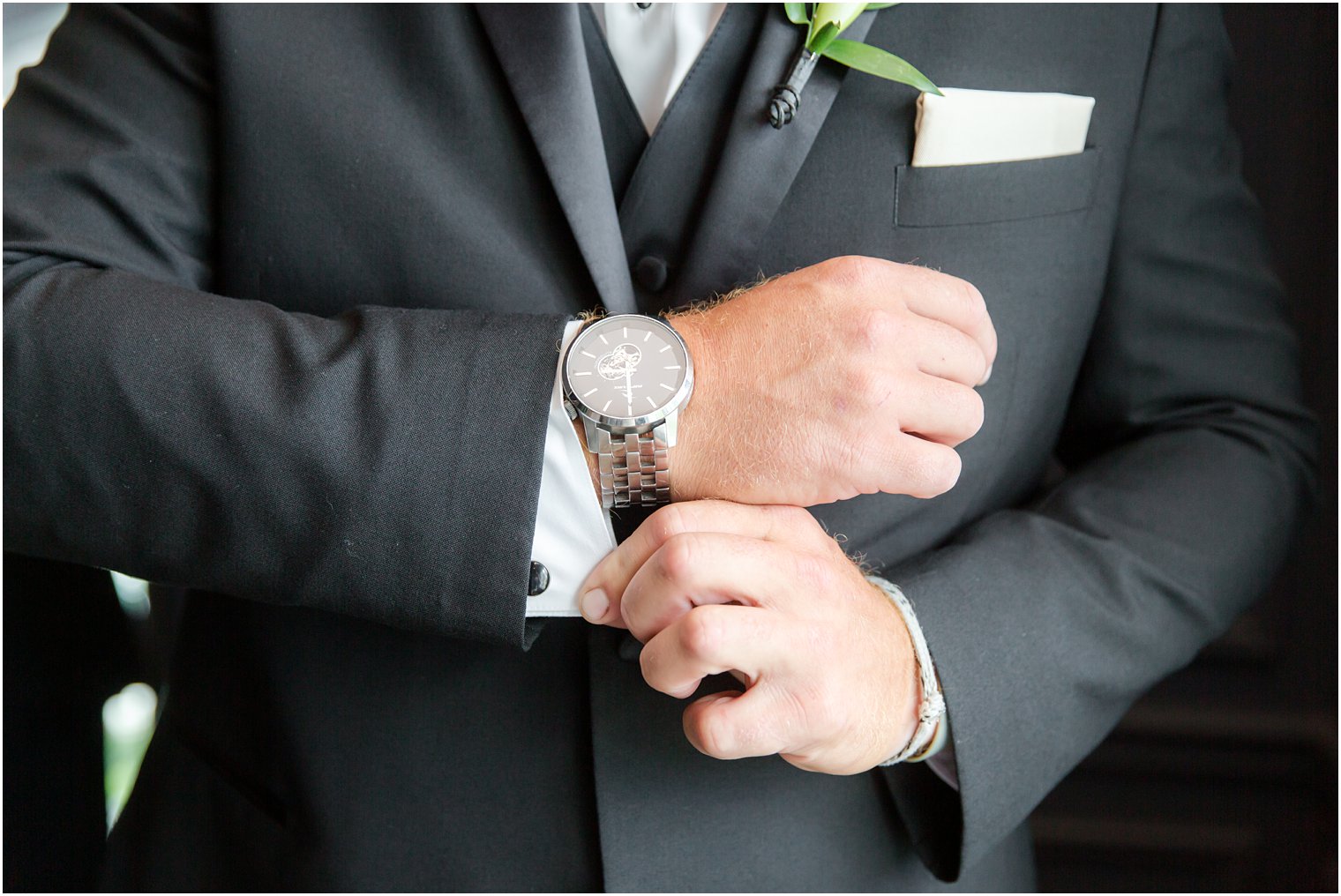 Groom getting ready for wedding at Park Chateau Estate and Gardens