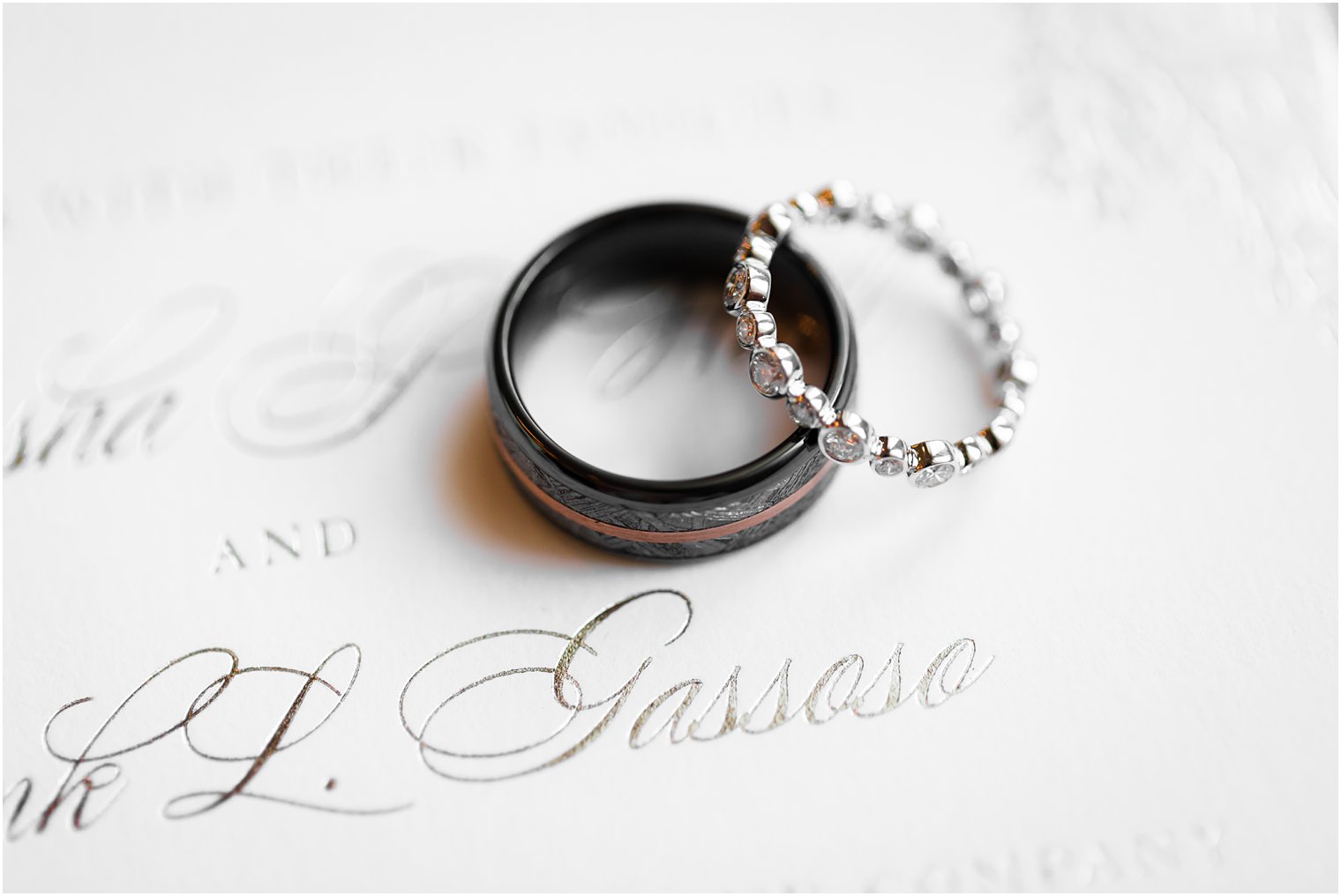 Wedding bands on invitation at Park Chateau Estate Wedding