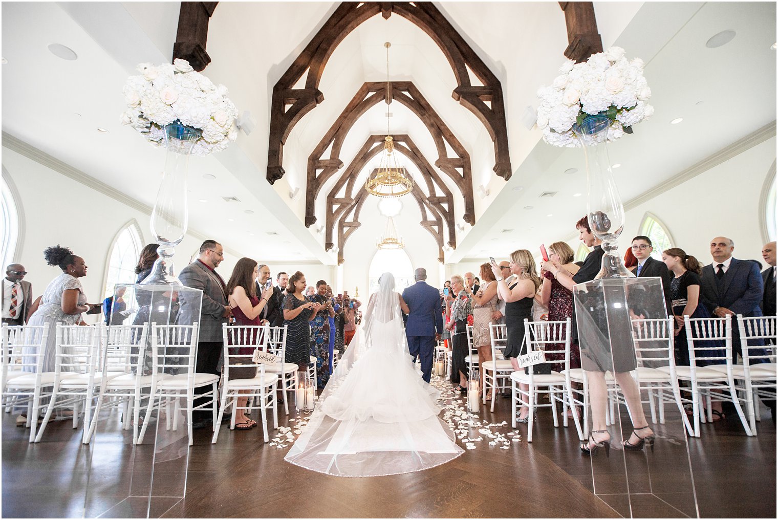 Bride walking down the aisle at Park Chateau Estate Chapel Wedding