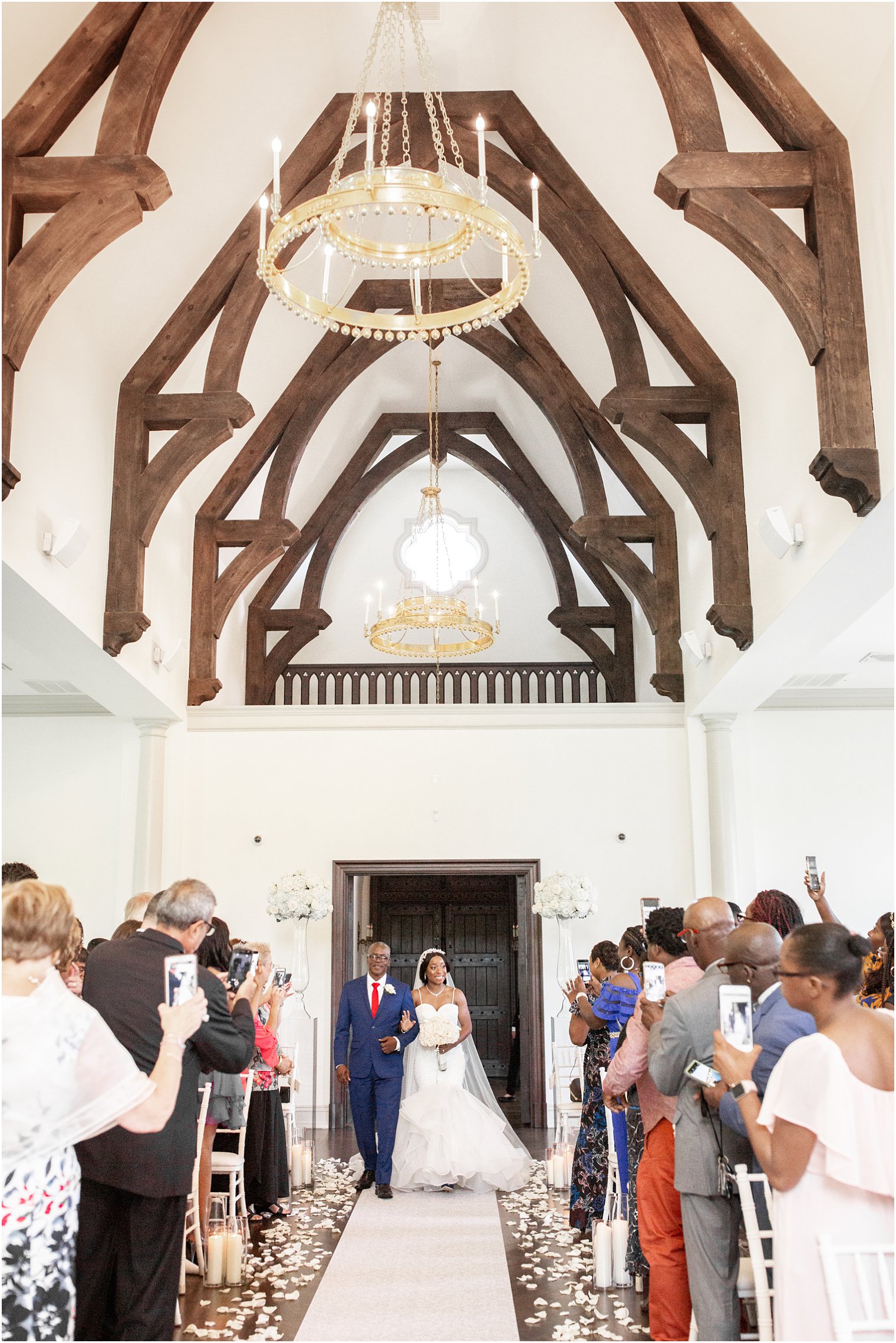 Bride walking down the aisle at Park Chateau Estate Chapel Wedding