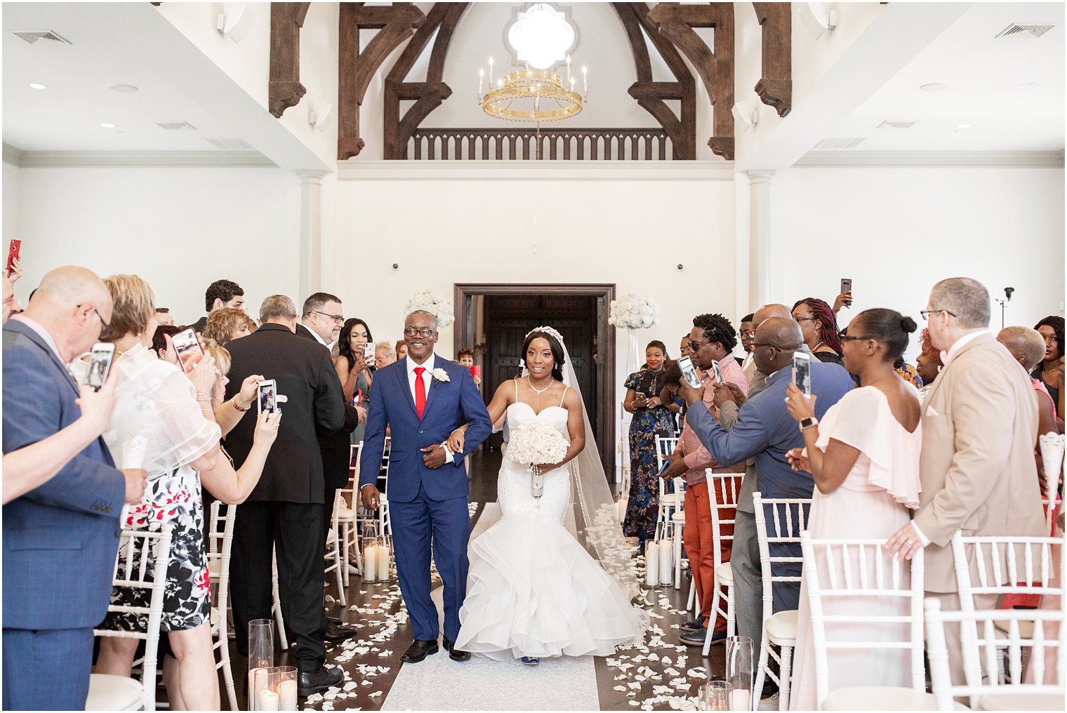 Bride walking down the aisle at Park Chateau Estate Chapel Wedding