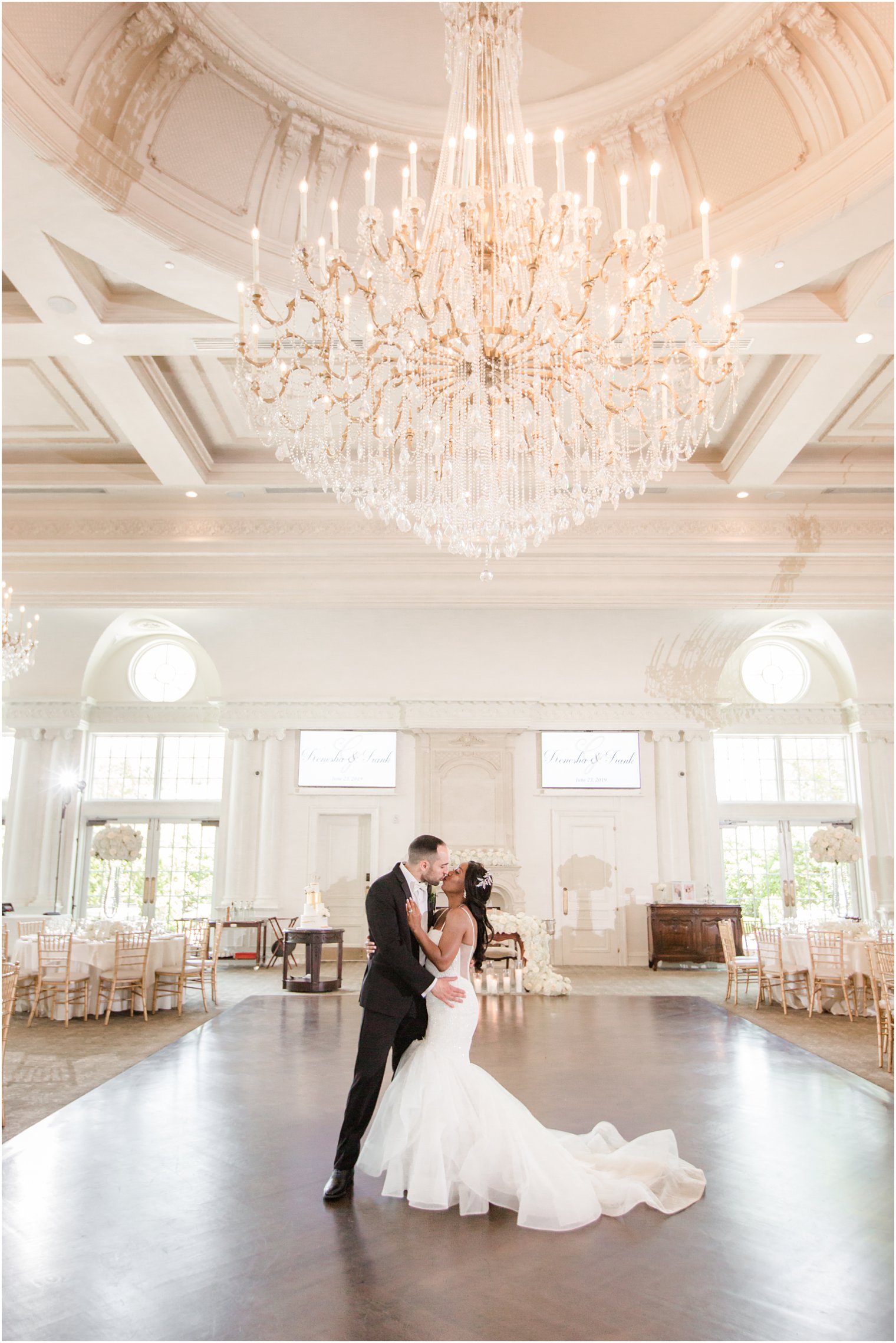 Bride and groom in the ballroom at Park Chateau