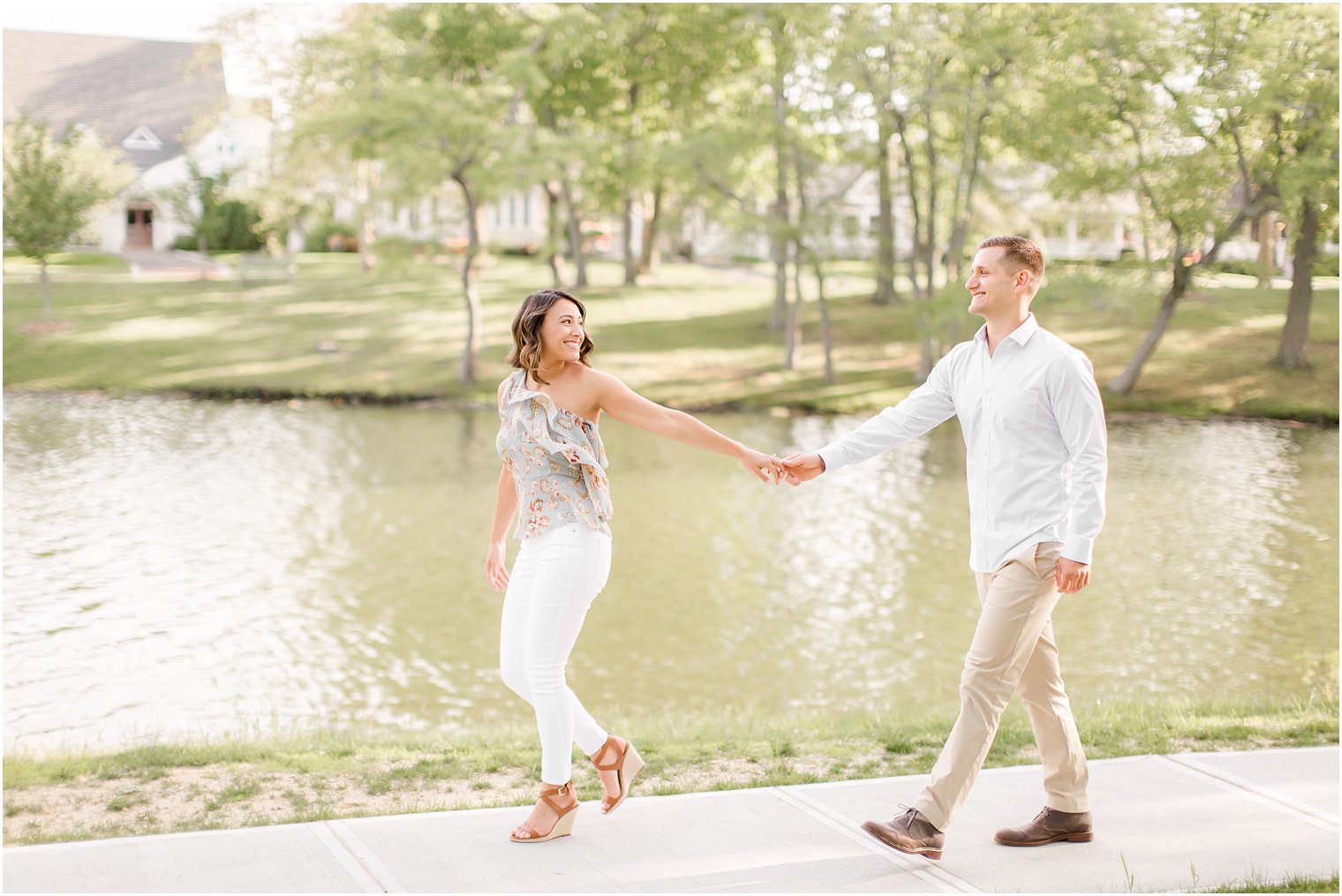 Engaged couple walking in Spring Lake NJ by Spring Lake Wedding Photographer