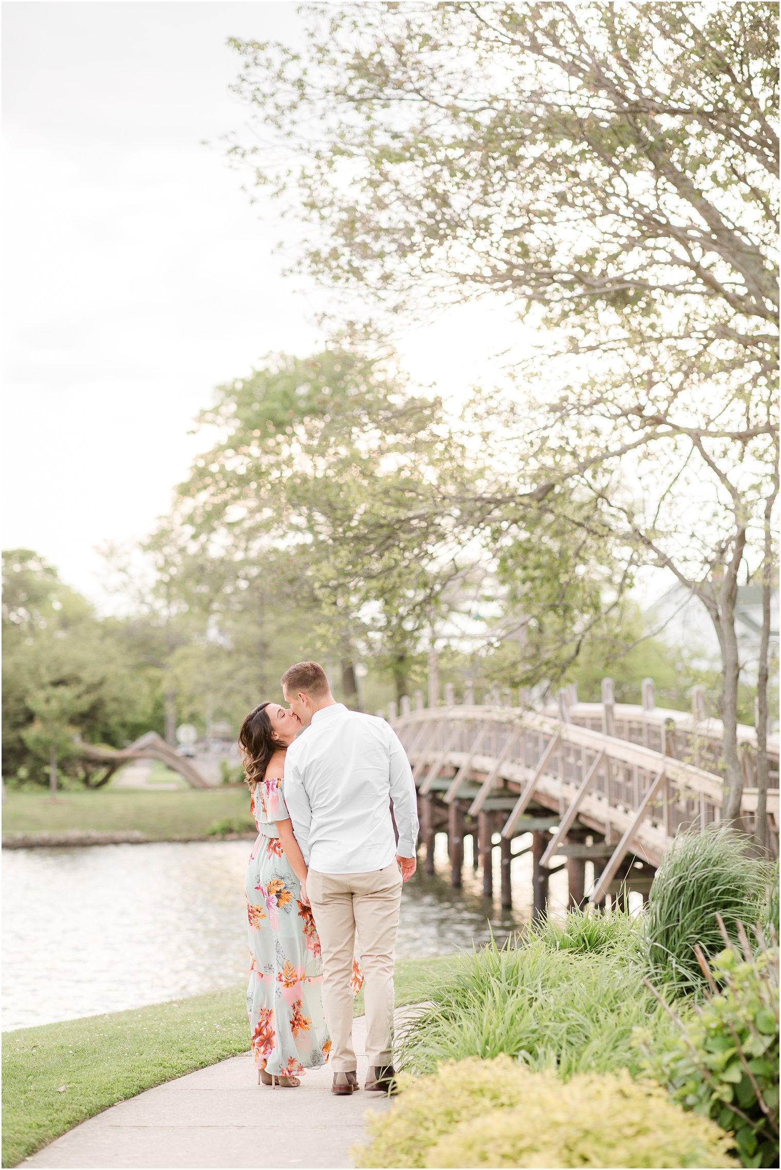 Engagement photos of couple at Divine Park by Spring Lake Wedding Photographer