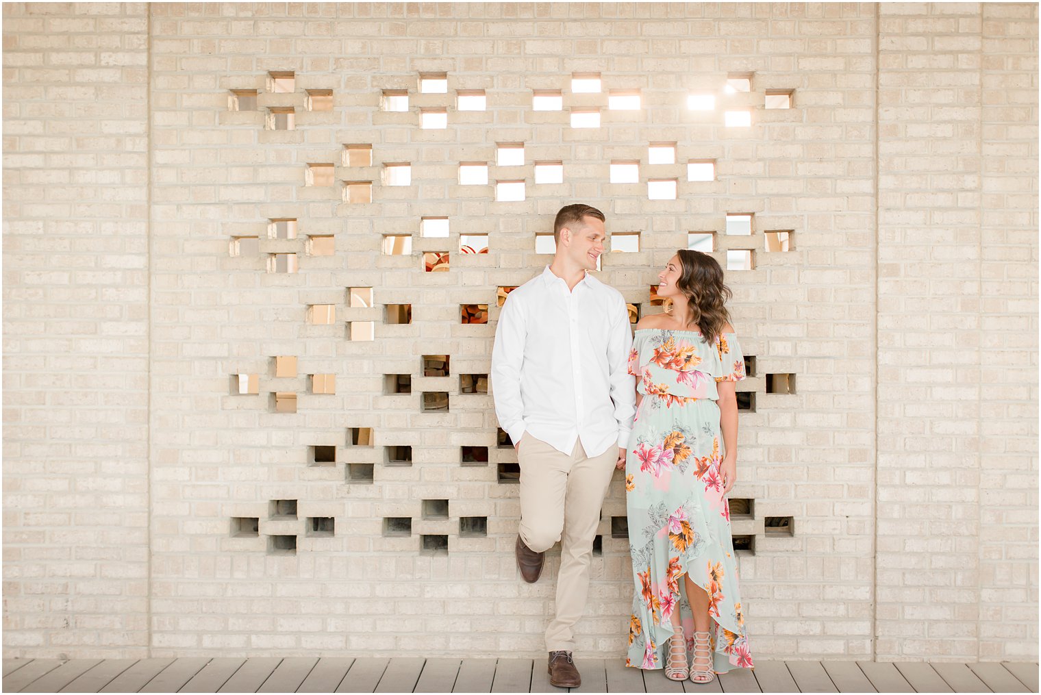 Engagement photos on the boardwalk by Spring Lake Wedding Photographer