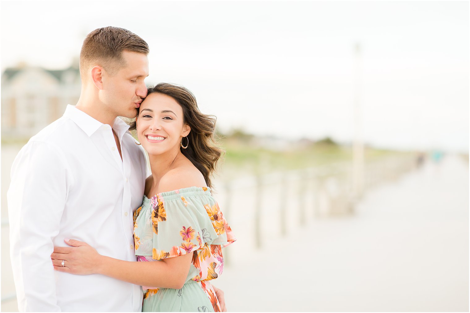 Engagement photos on the boardwalk by Spring Lake Wedding Photographer