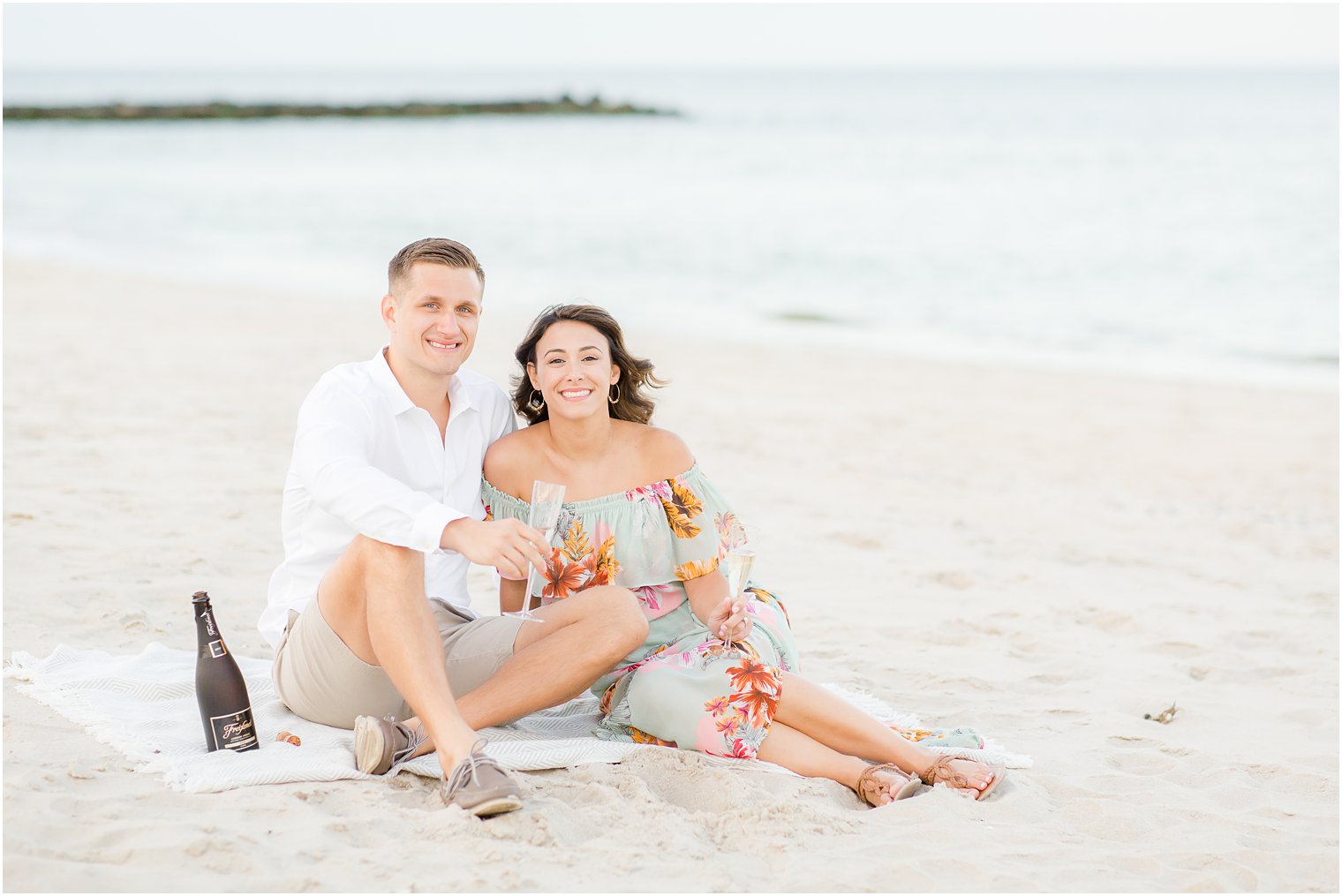 Engagement photos on the beach by Spring Lake Wedding Photographer