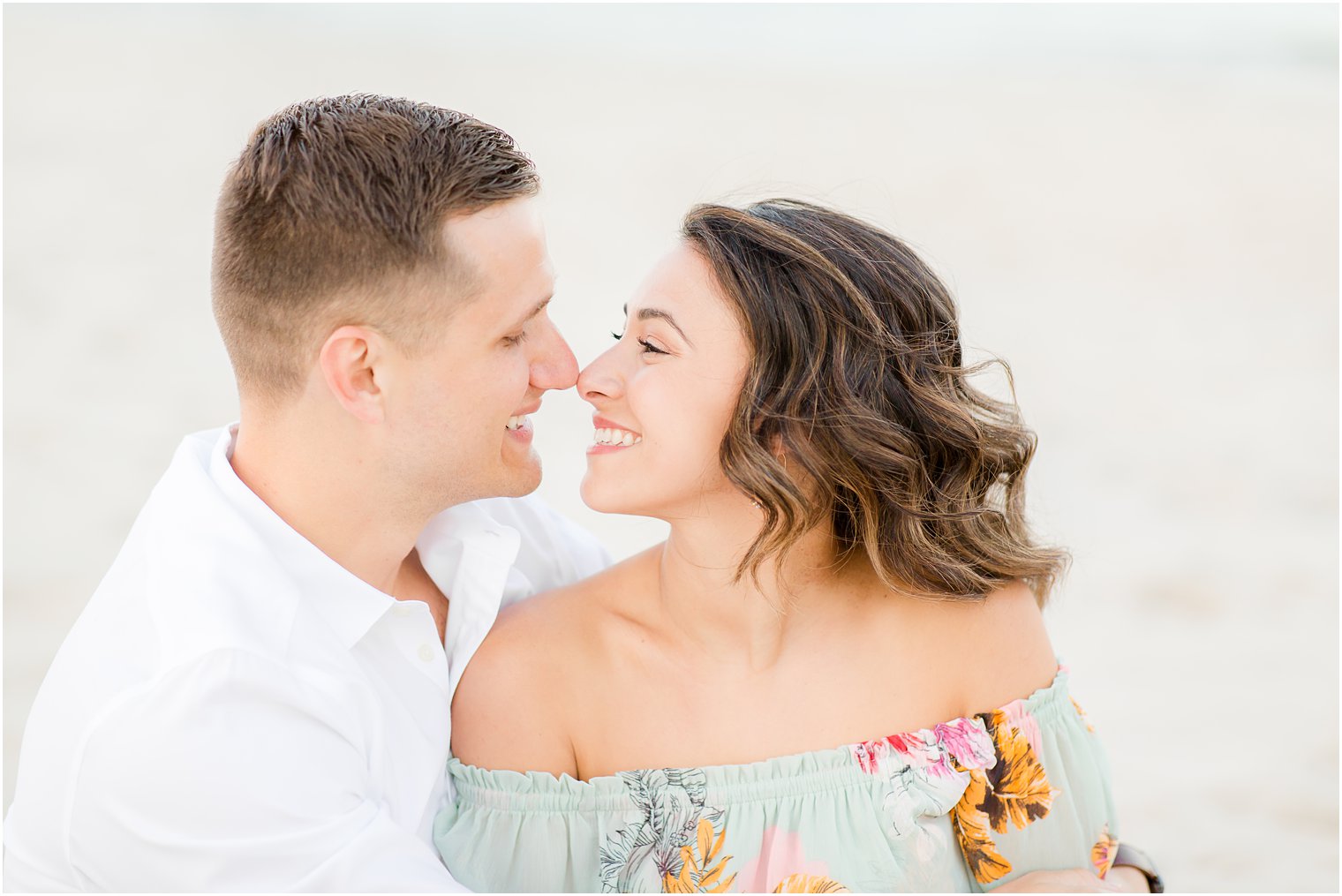 Engagement photos on the beach by Spring Lake Wedding Photographer