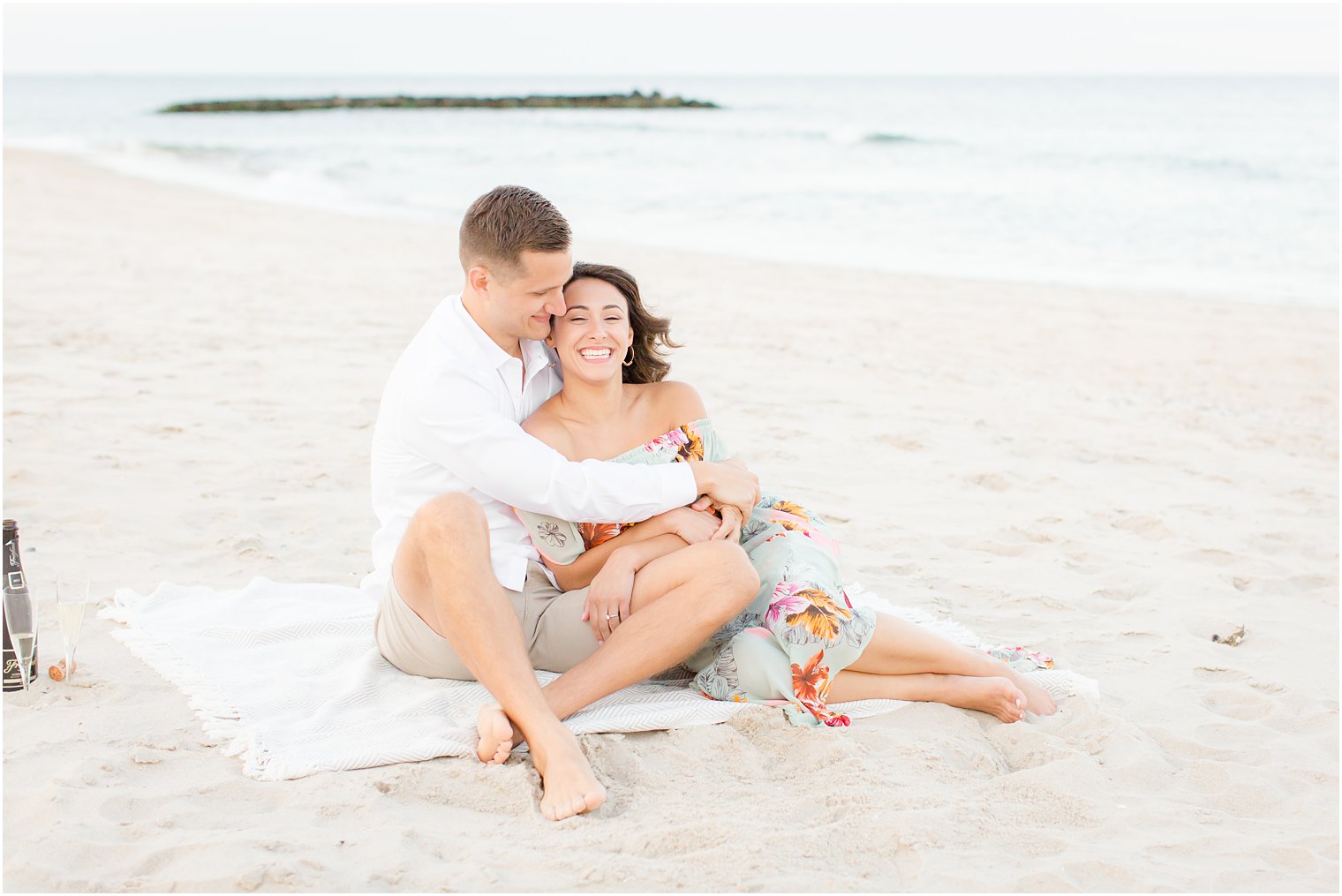 Engagement photos on the beach by Spring Lake Wedding Photographer