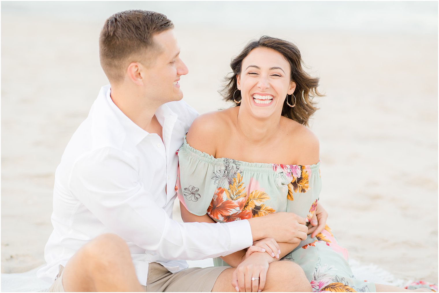 Engagement photos on the beach by Spring Lake Wedding Photographer