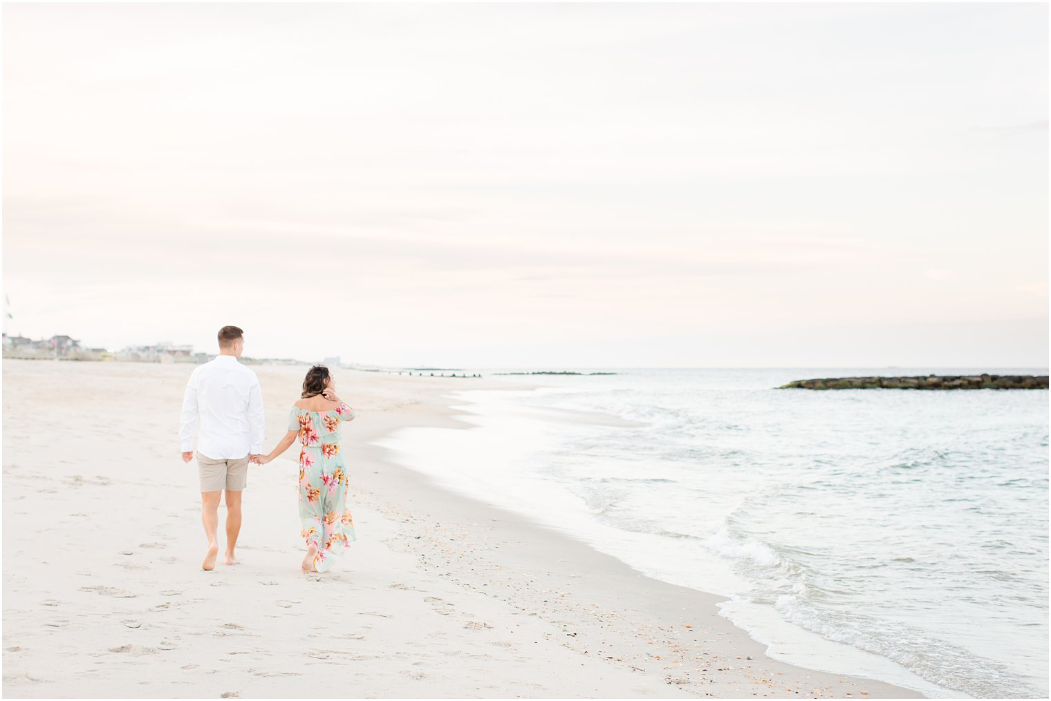 Engagement photos on the beach by Spring Lake Wedding Photographer