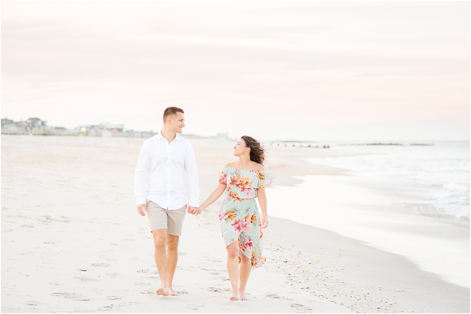 Engagement photos on the beach by Spring Lake Wedding Photographer