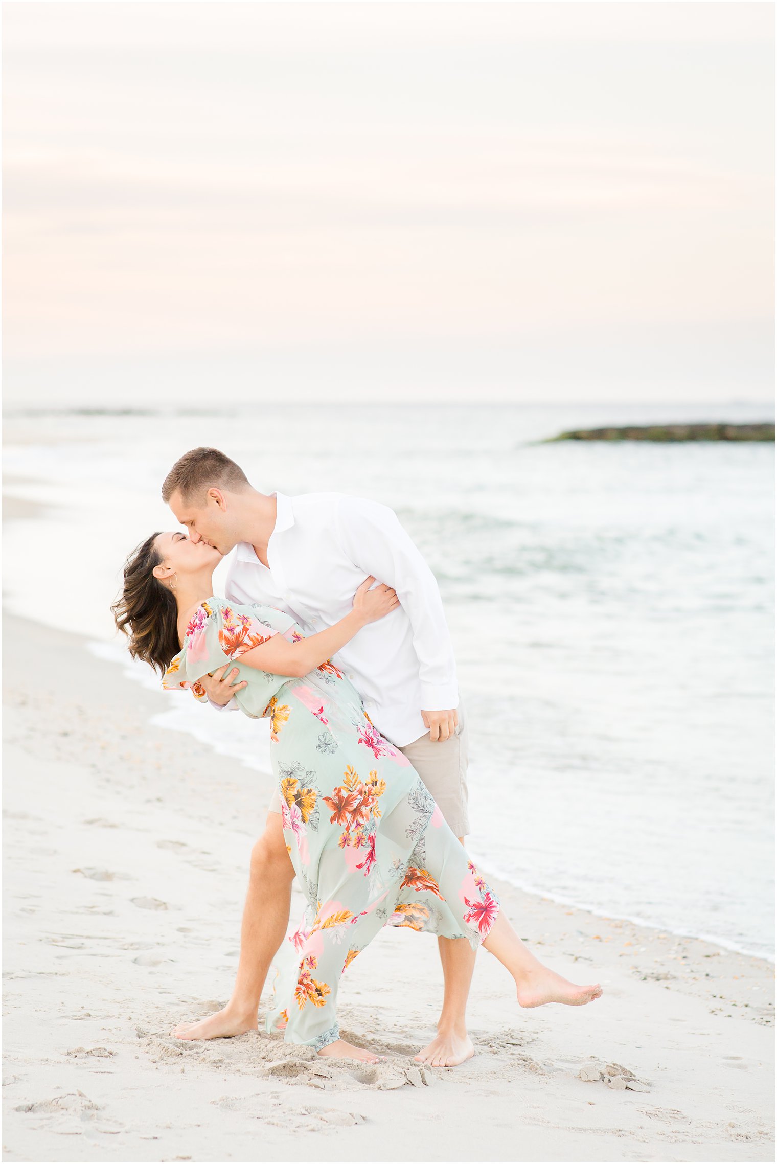 Engagement photos on the beach by Spring Lake Wedding Photographer