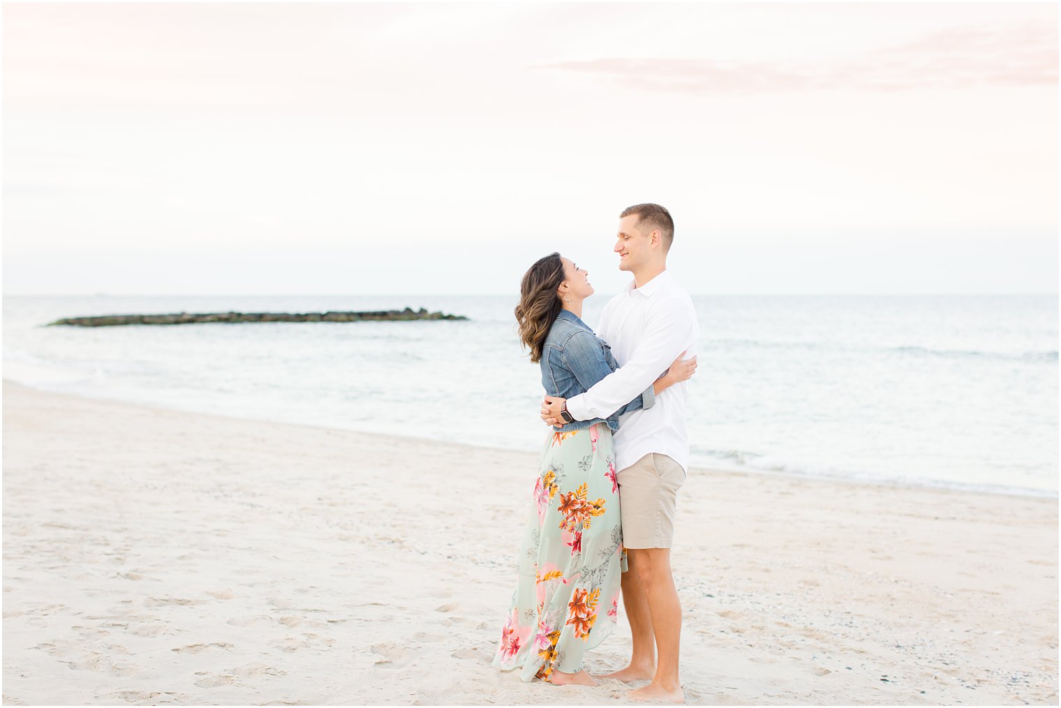 Engagement photos on the beach by Spring Lake Wedding Photographer