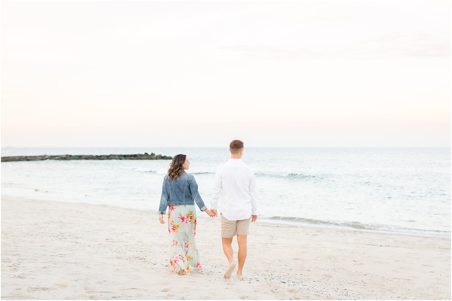 Engagement photos on the beach by Spring Lake Wedding Photographer