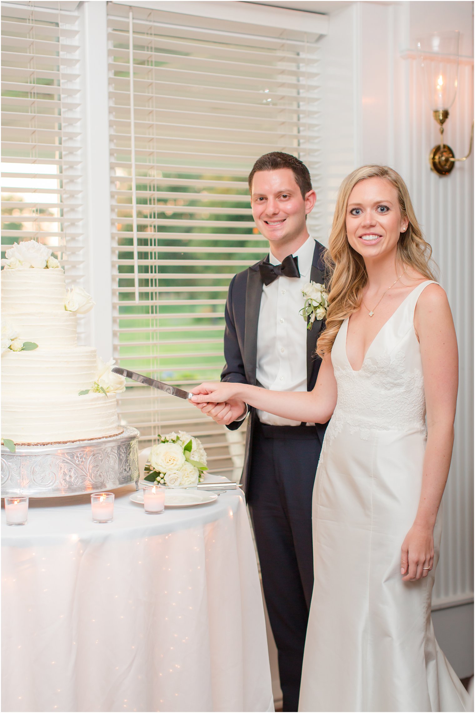 Wedding reception cake cutting at Stone Harbor Golf Club Wedding 