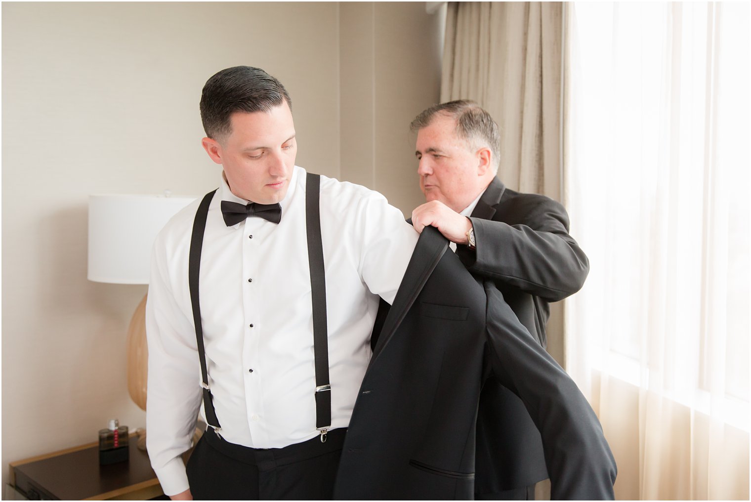 groom getting ready with his father for Indian Trail Club Wedding