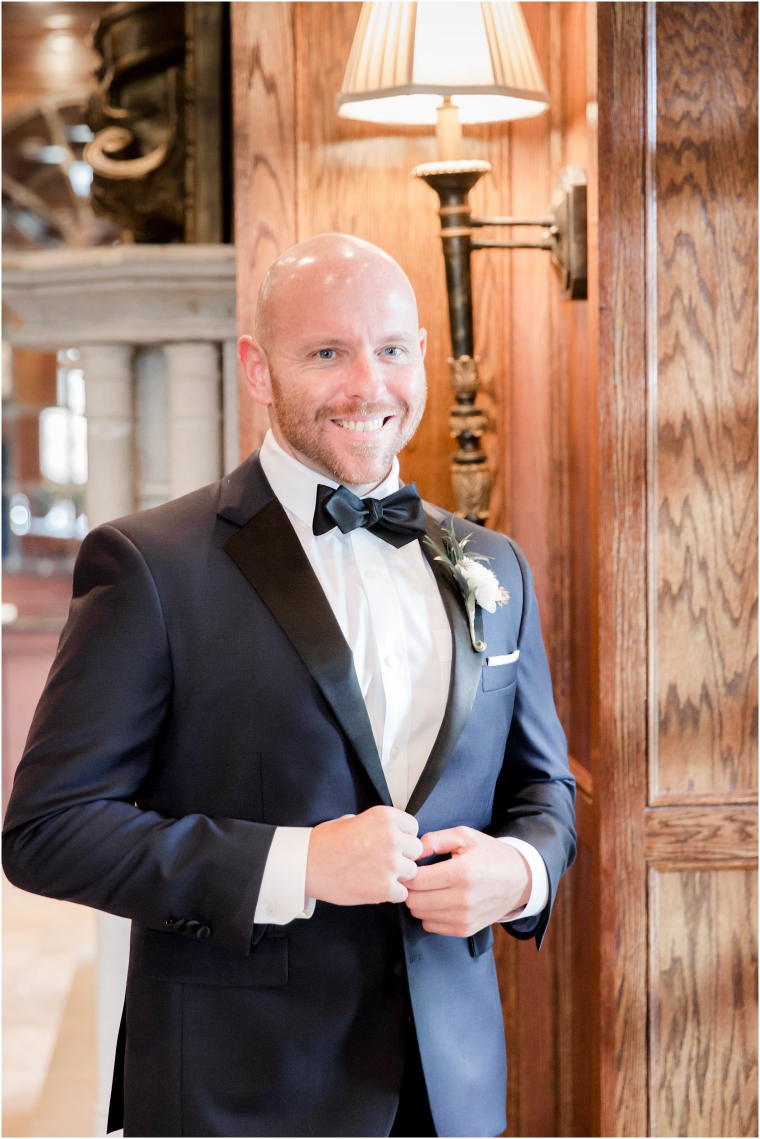 groom getting ready in groom's lounge of The Ashford Estate