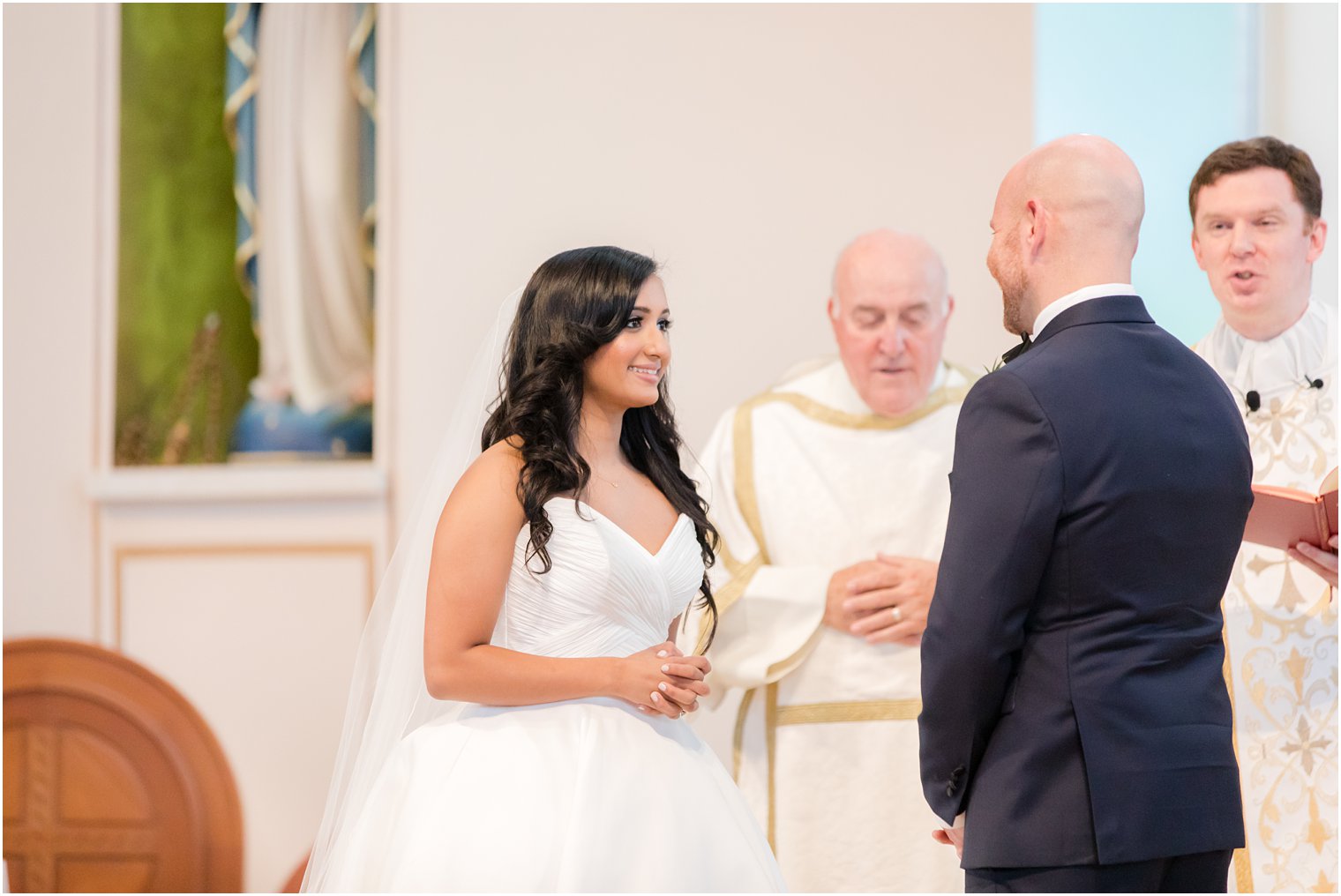 Exchange of vows at Wedding ceremony at St. Gregory the Great in Hamilton, NJ