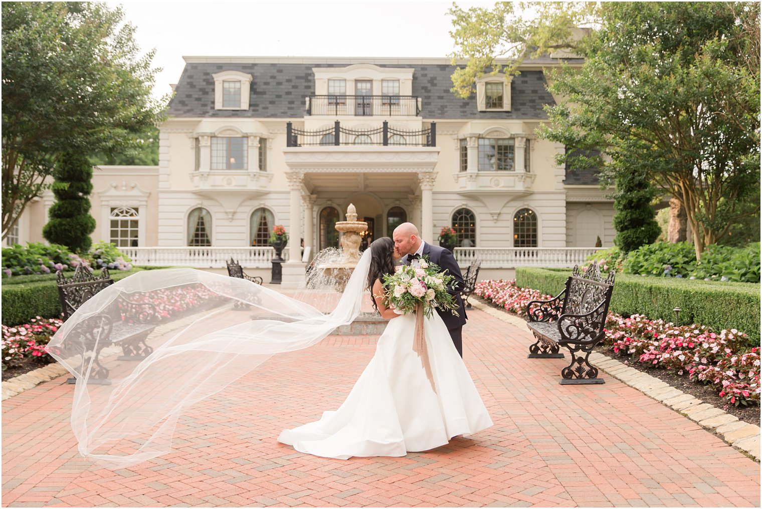 Bride and groom in front the Ashford Estate