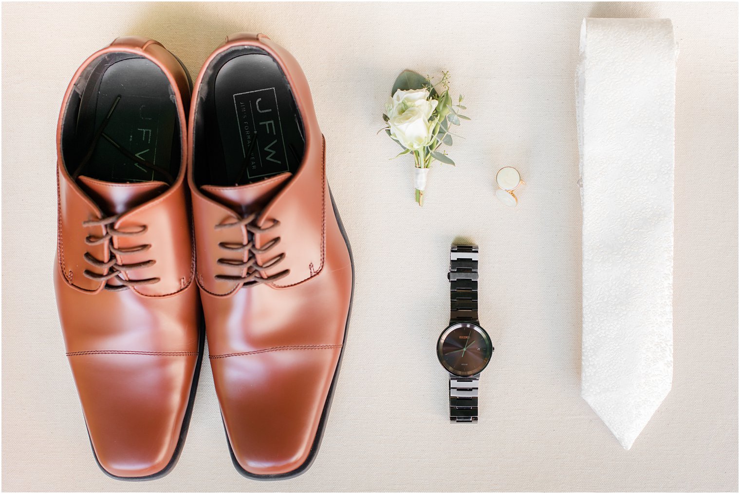 Groom details with brown shoes