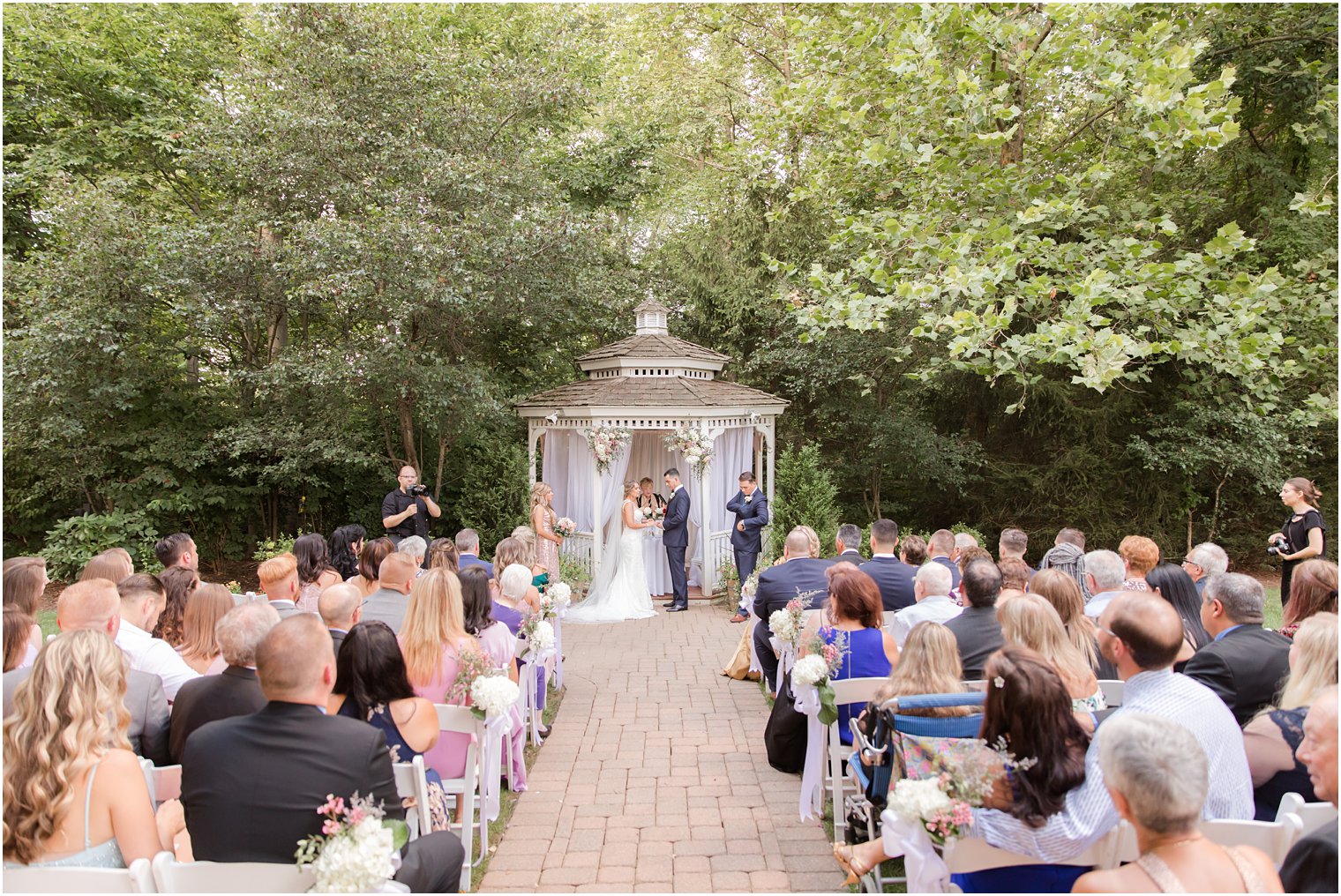 Outdoor ceremony at the Grain House at the Olde Mill Inn in Basking Ridge, NJ