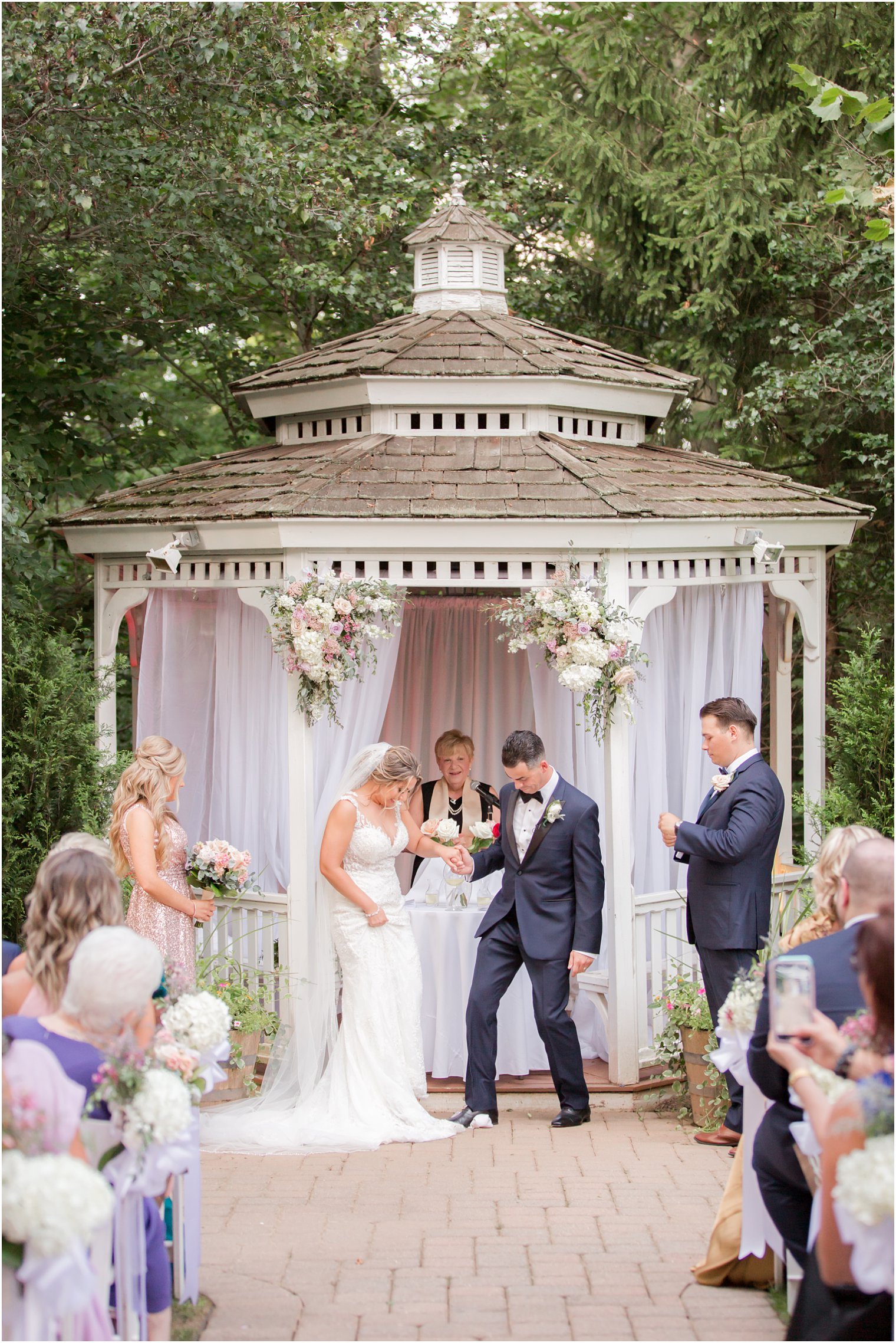 Outdoor ceremony at the Grain House at the Olde Mill Inn in Basking Ridge, NJ
