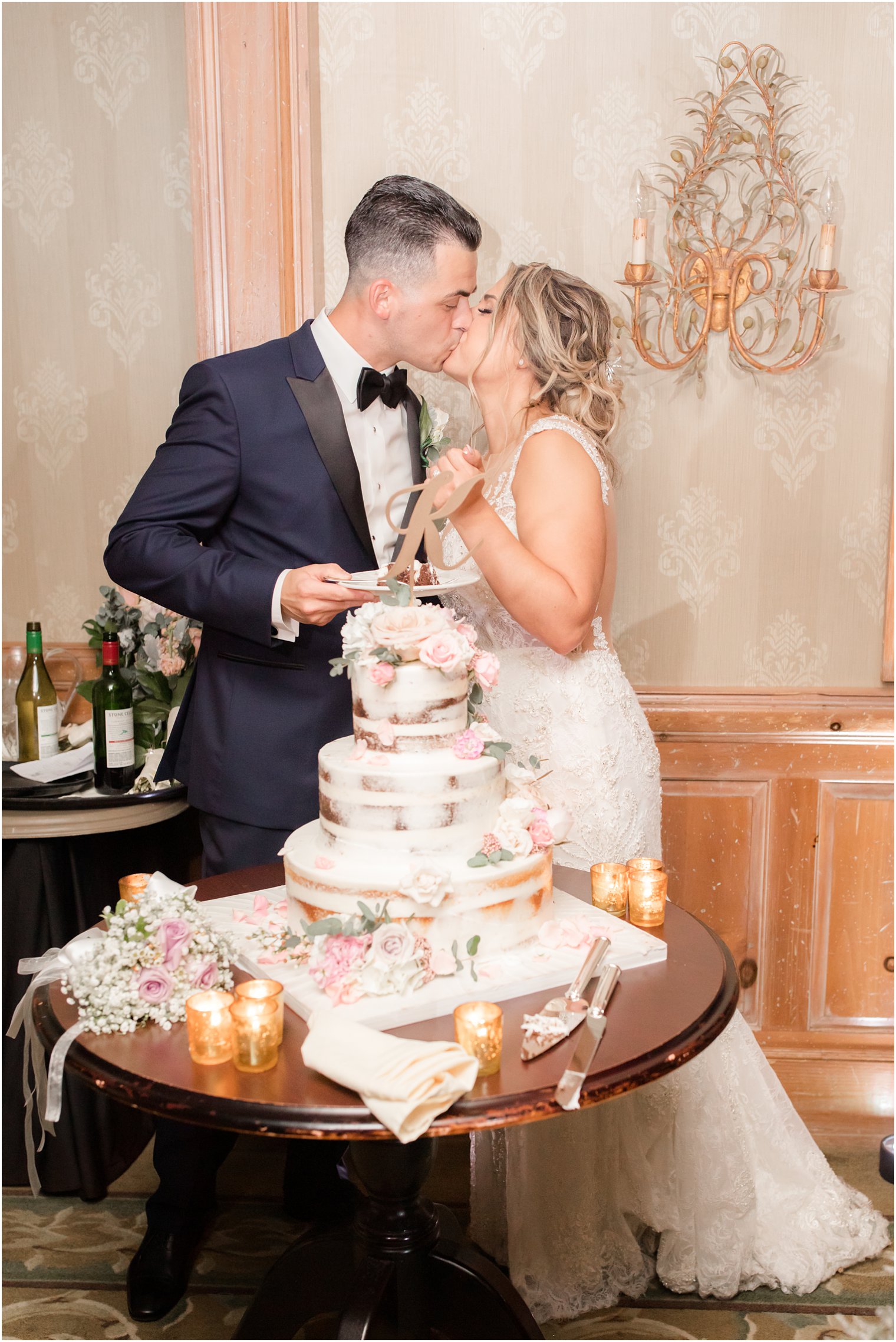 Cutting the wedding cake at the Grain House at the Olde Mill Inn in Basking Ridge, NJ