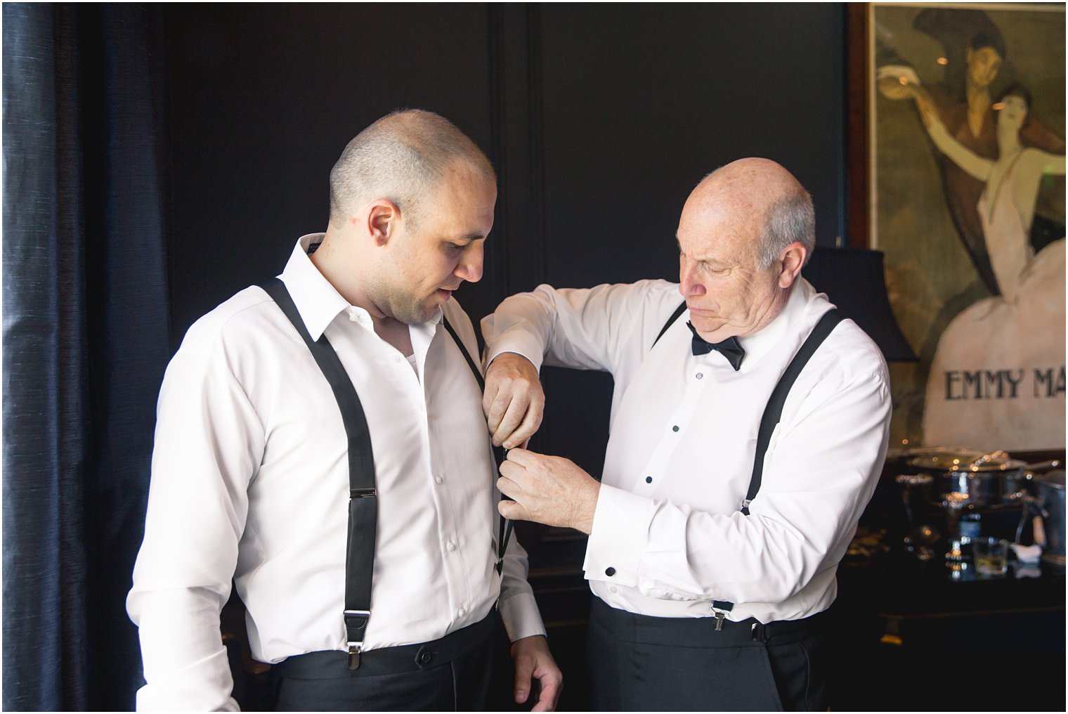 Groom getting ready with his father at Park Chateau Estate