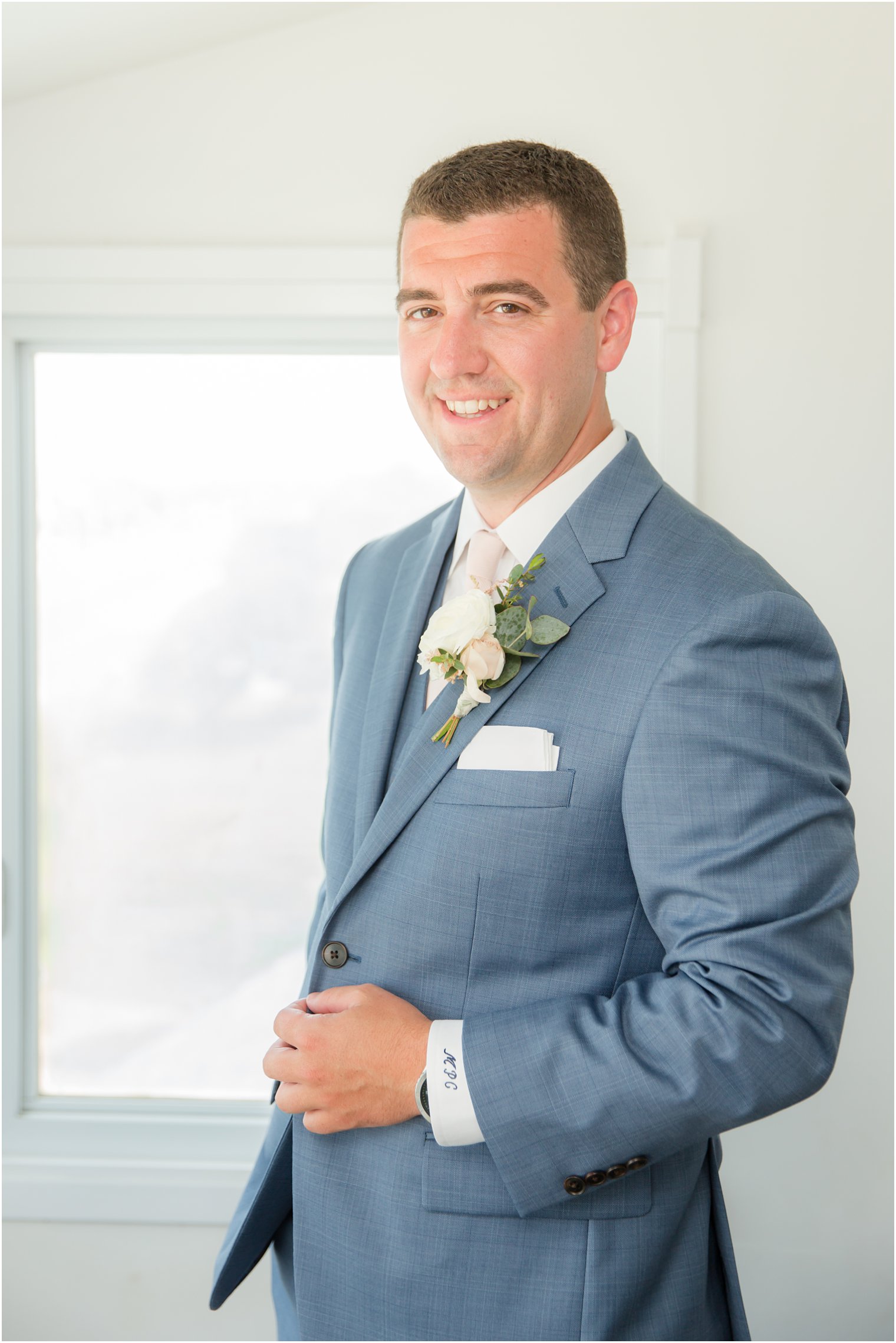 Groom portrait before Sandy Hook Chapel wedding day photographed by Idalia Photography